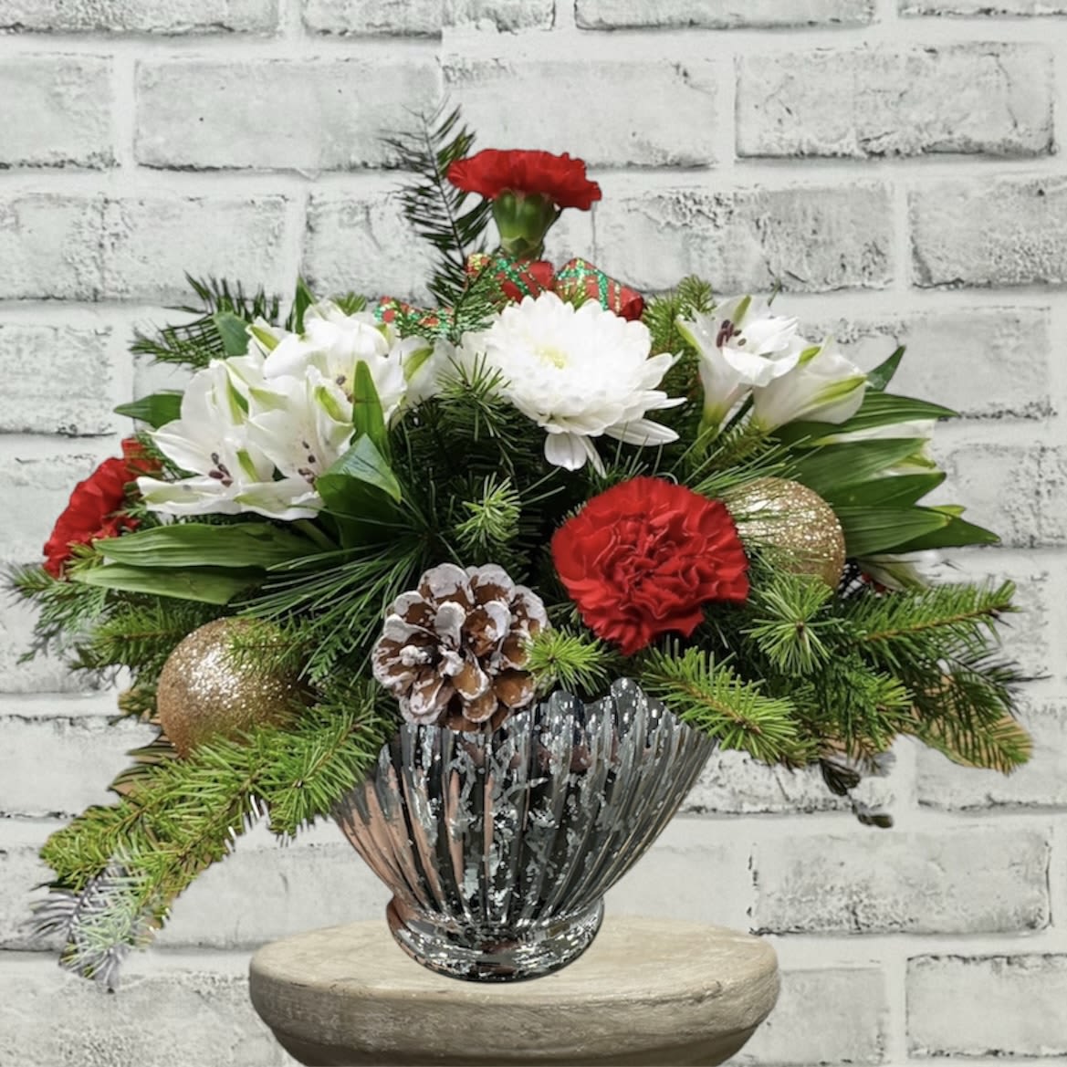 Home for Christmas FG - Charming round design with holiday evergreens, red and white flowers, Christmas balls and frosty branches.  Perfect for your coffee table or smaller round dining table.  Approximately 15 1/2&quot; H and 15&quot; W.
