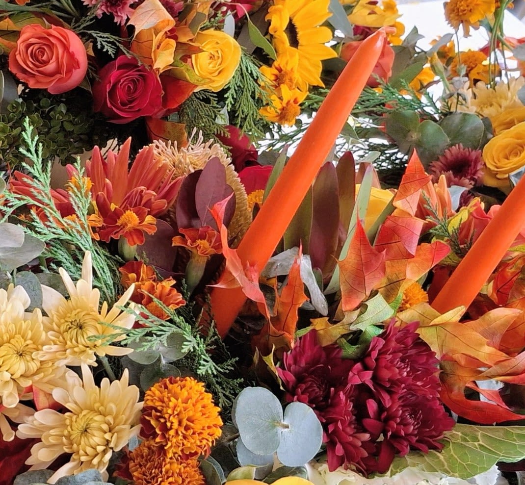 Autumn Traditions  - A Bountiful array of fall blooms designed to the festivities of the season. Candles included.