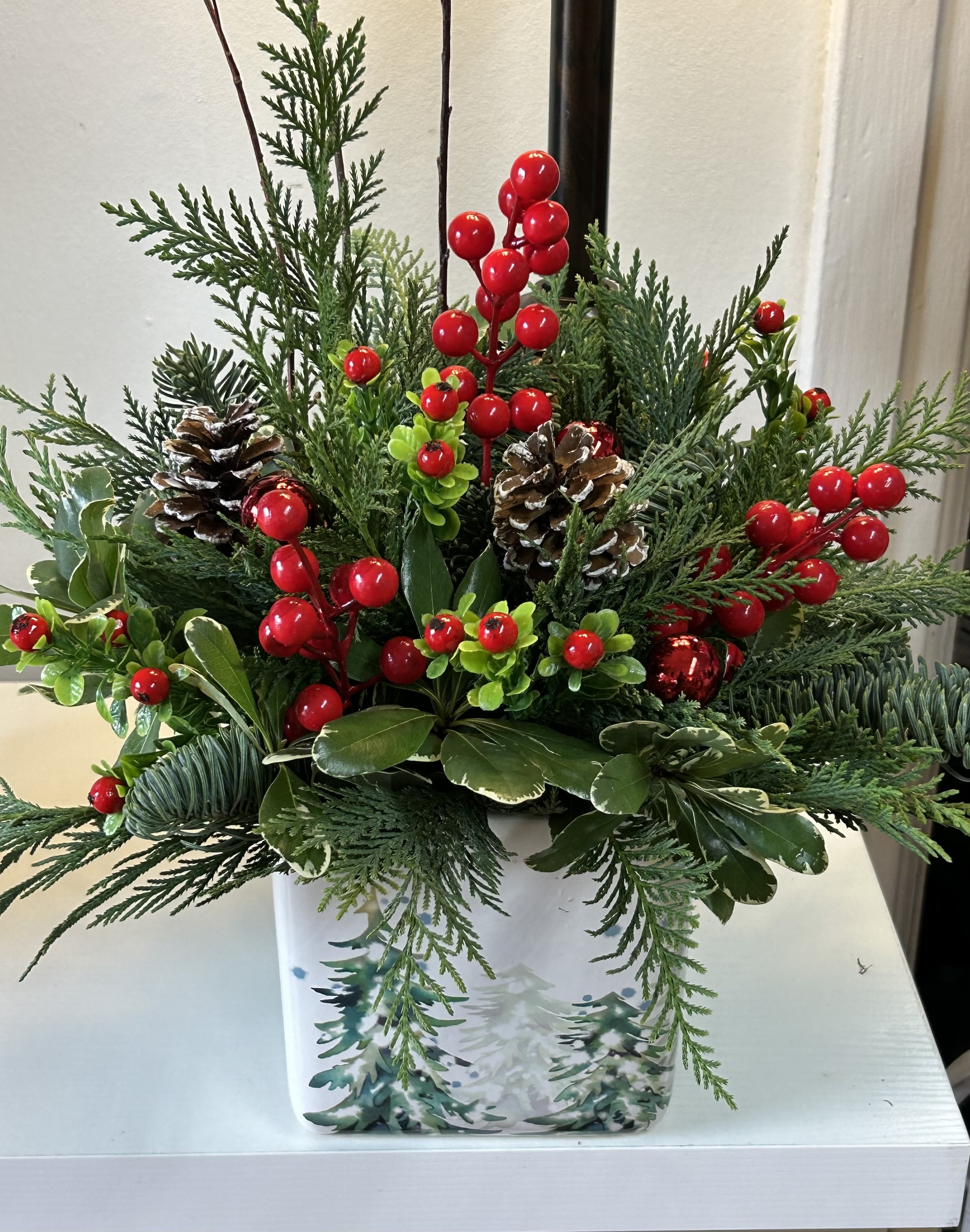 Woodlands Bouquet  - Premium Christmas greenery with pinecones, red berries in a ceramic woodland container
