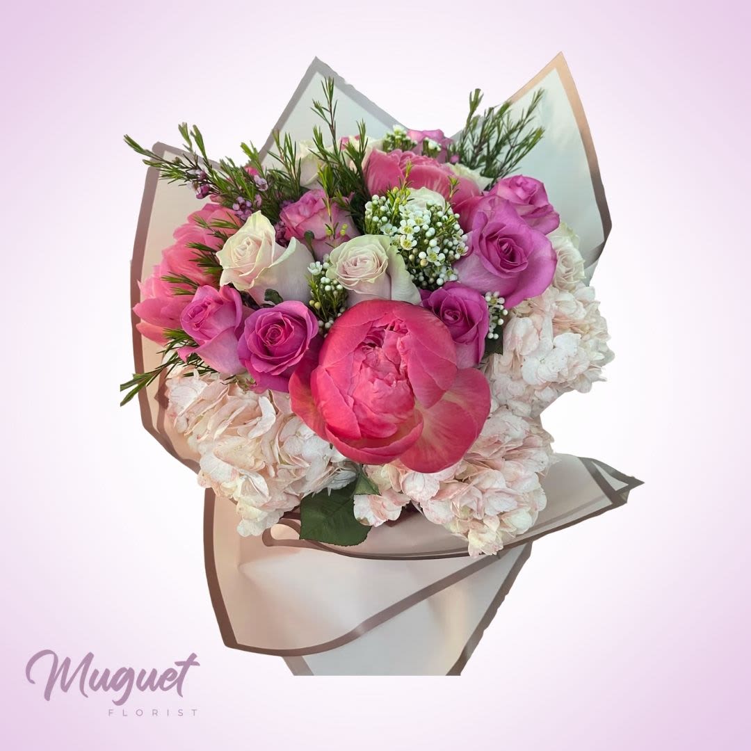 Blushing Harmony: A delicate blend of soft peonies and romantic roses, wrapped in elegance. - Each petal whispers love, inviting you to savor the beauty of nature. Perfect for celebrating special moments or simply brightening your day.    Item: 1822 Care Instructions: For the best vase life, change the water every two days. This arrangement includes a newly cleaned vase and good quality water &amp; flower food.  Varieties and colors of flowers may vary according to season and availability.