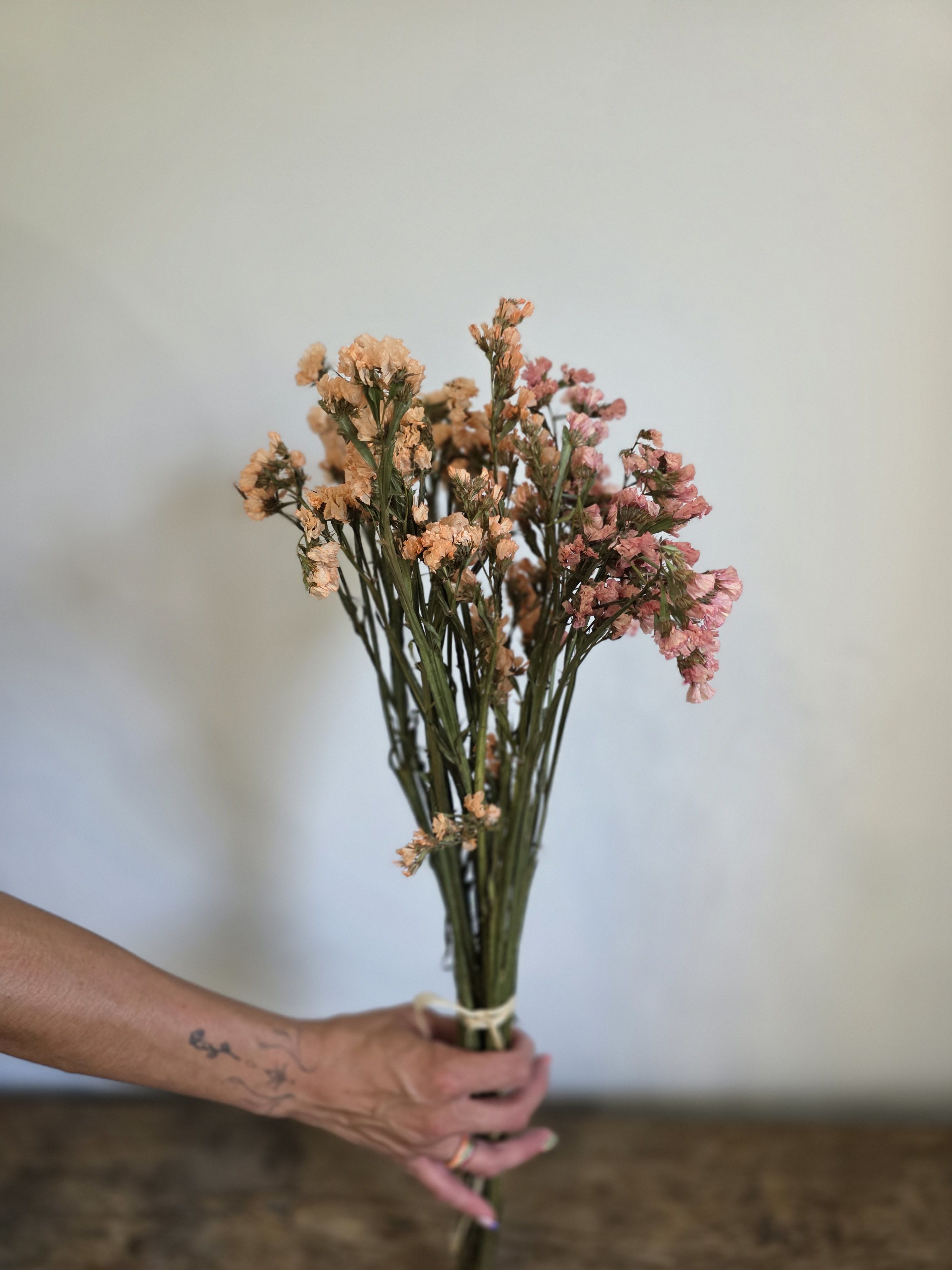 Dried Bunch - Statice - Naturally beautiful and effortlessly timeless, our Dried Flower Bunches are perfect for styling vases, crafting arrangements, or adding a touch of texture to your space. Each bundle features carefully preserved botanicals with long-lasting color and structure—no water or upkeep needed. Mix and match for a custom look or let a single variety shine on its own.  Statice