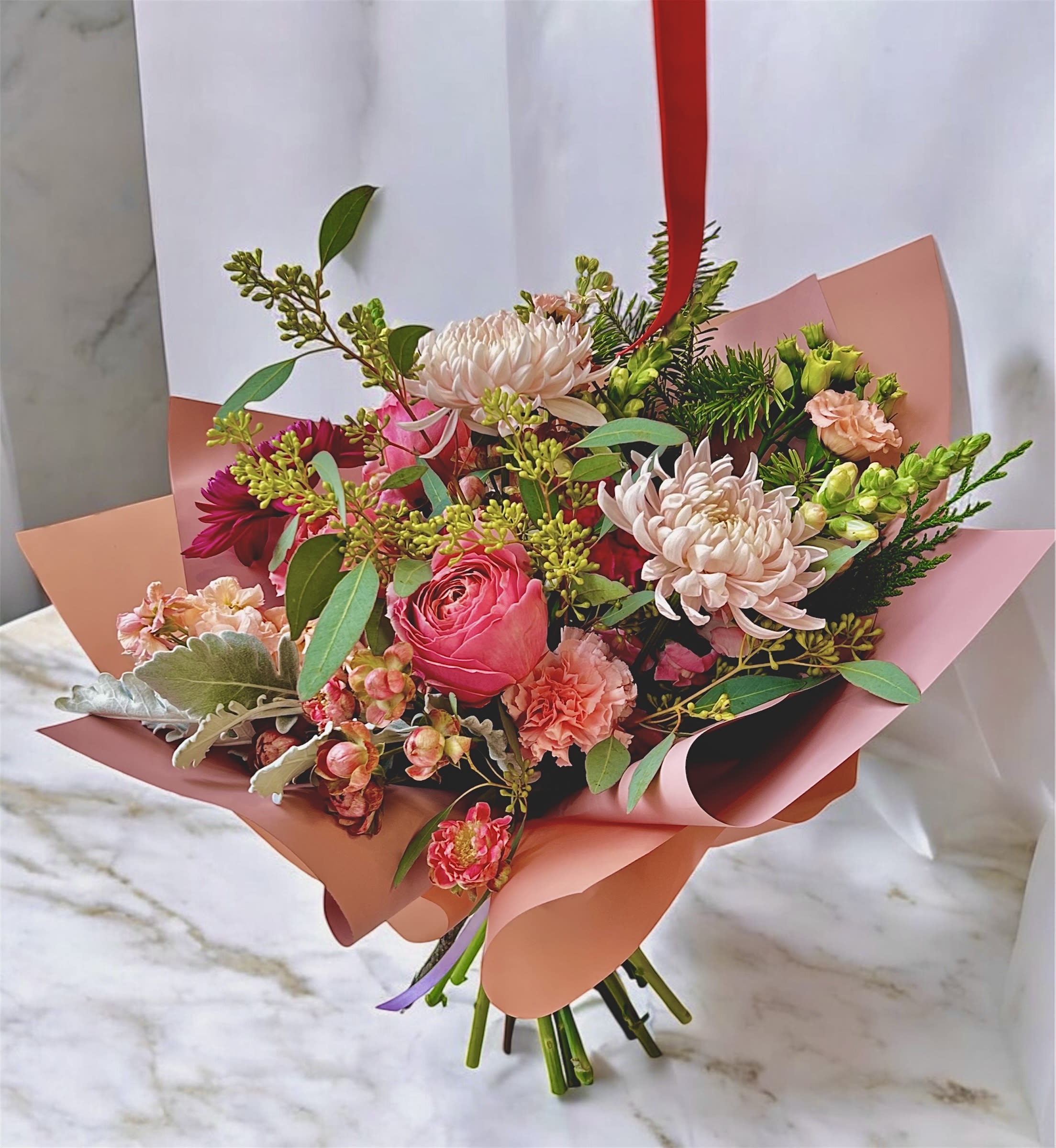 Pink Christmas: Charity  - Please keep in kind that no arrangement can be made identical to the photos shown (as some flowers are seasonal). Therefore, we will substitute them accordingly with in-season flowers instead. We will do our absolute best to arrange the flowers as similar as possible with the photos shown!   For Bouquets, we DO NOT include vases unless you add one.  For Vased Flowers, we include vases.   Right now, you can expect spring blooms sourced from local farms.   We use small ordinary 4in by 3in cards. If you want to send flowers with a special messaging card, please choose one from add-ons!  Delivery: our standard delivery time window is between 3:00pm and 5:00pm.   If you have any questions regarding the order, please feel free to contact us!   Email: agapeflower.studio25@gmail.com  