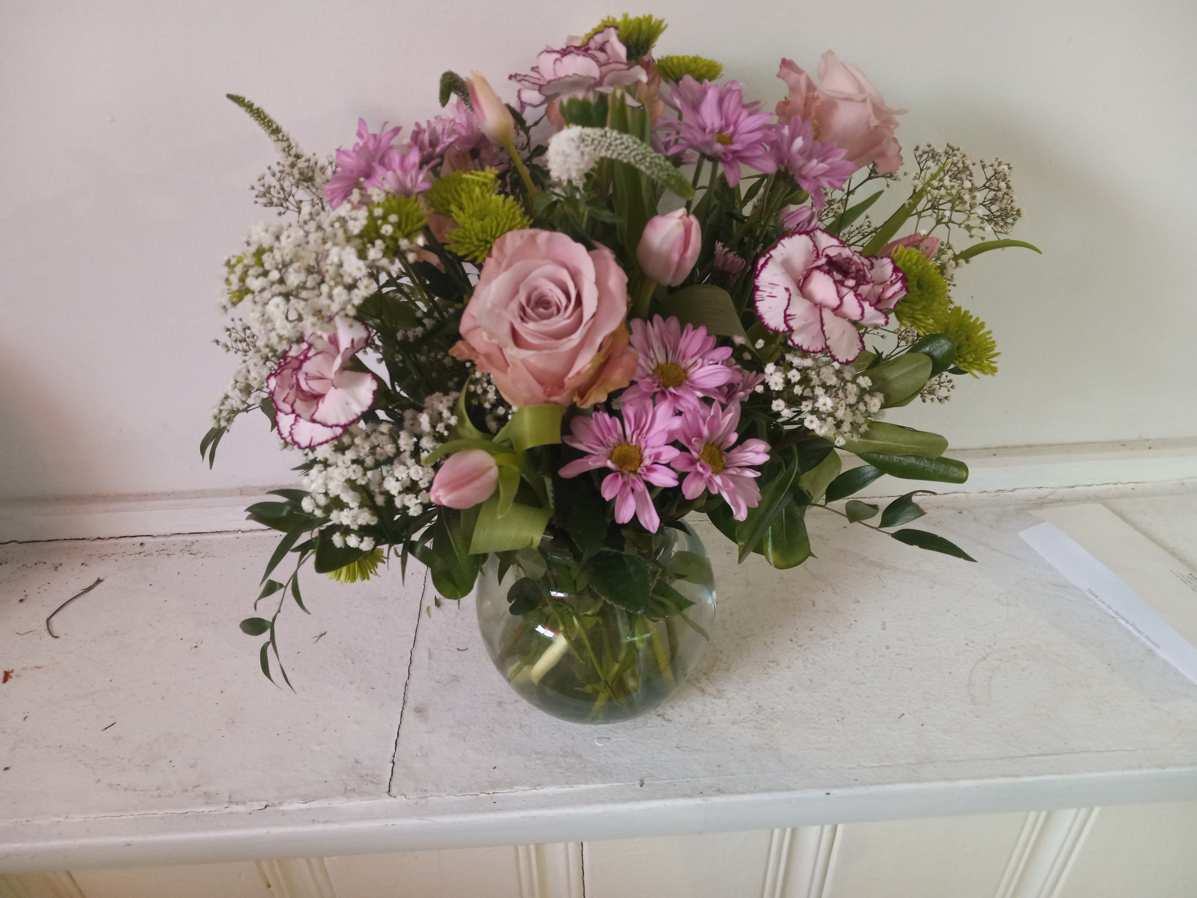 &quot;Paulina&quot; - Beautiful light purple tones daisies, carnations, roses, tulips and baby's breath with vivid greenery in a vase garden style arrangement