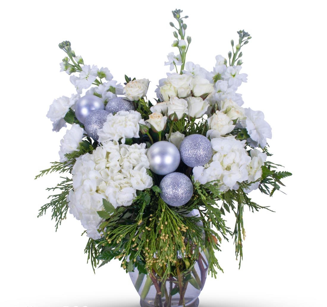 Christmas Cheer - Christmas in Florida has its own special vibes. Make the season more festive with this beautiful floral bouquet. Perfect for all your holiday gatherings!   (Flower types may vary due to availability) 