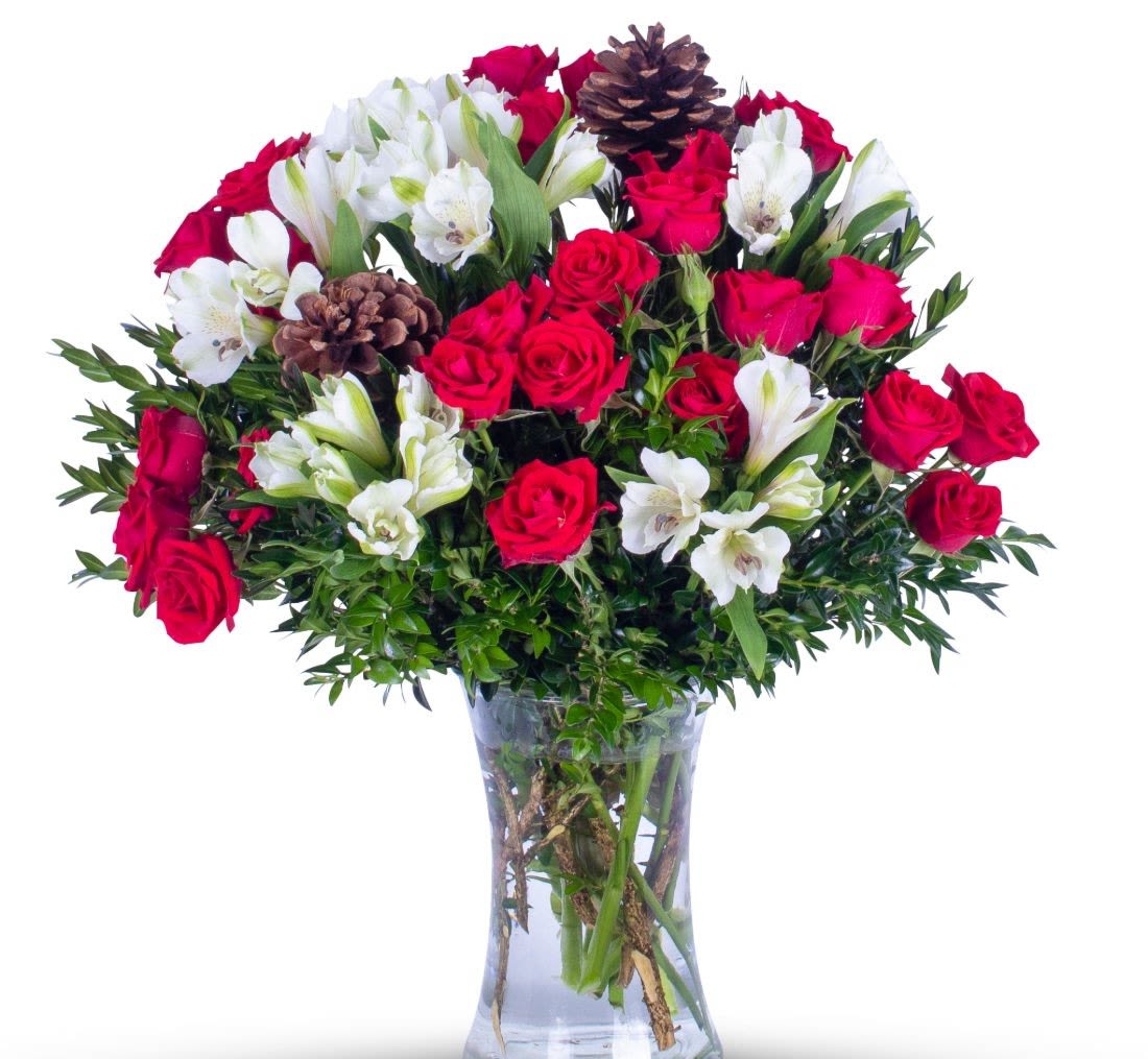 Holiday Happiness - The true gift of the holidays is the people you share it with. Accent your table with this beautiful evergreens and holiday florals. Perfect for all your Christmas get together!   (Type of flowers used may vary depending on availability)