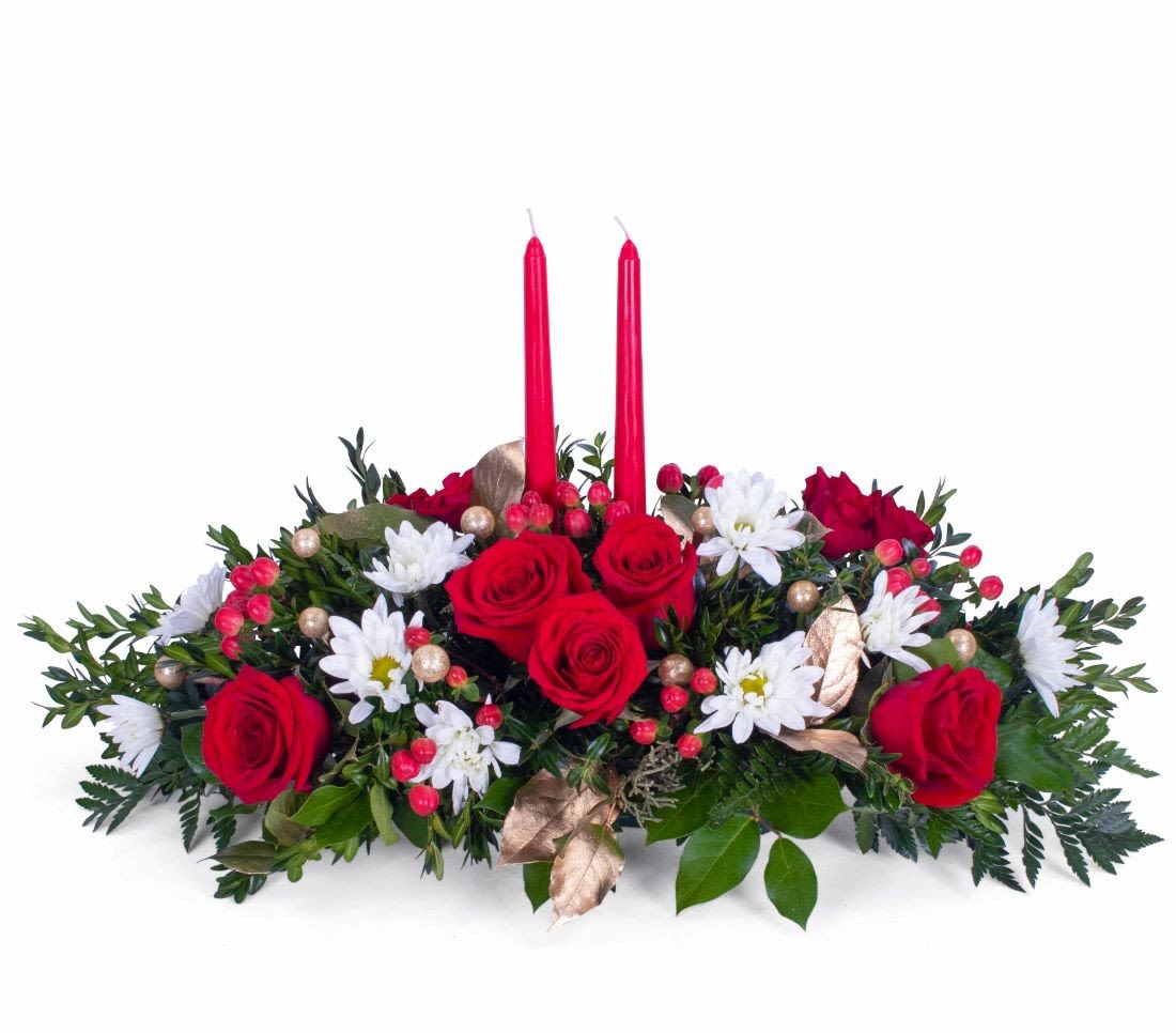 Gathering Cheer - The true gift of the holidays is the people you share it with. Accent your table with this beautiful centerpiece of evergreens and holiday florals. Perfect for all your Christmas get together!   (Type of flowers used may vary depending on availability)  