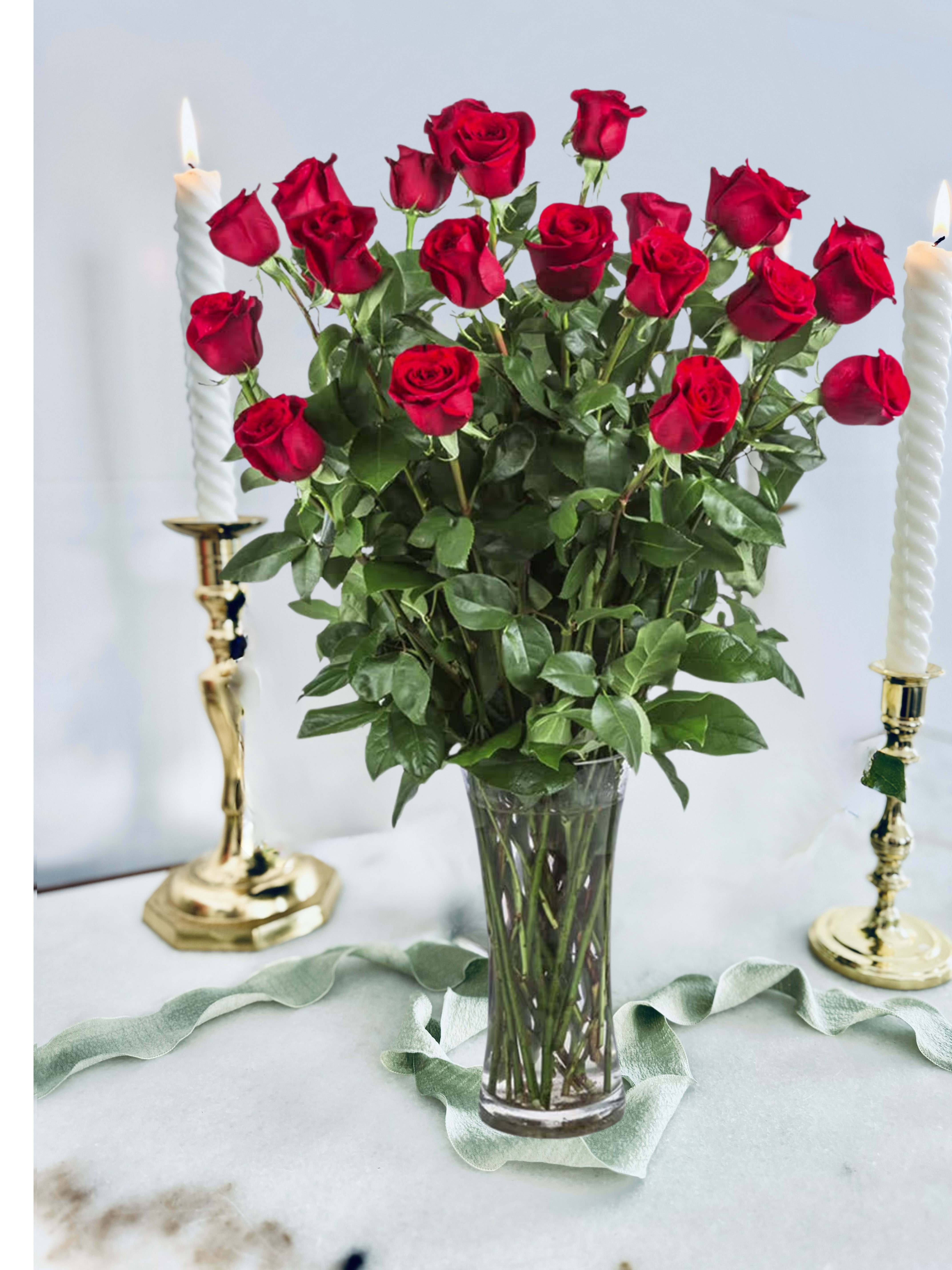 Two Dozen Long Stemmed Roses - These two dozen red roses provides the classic romantic gift. It's perfect for Valentine's Day or an Anniversary. 
