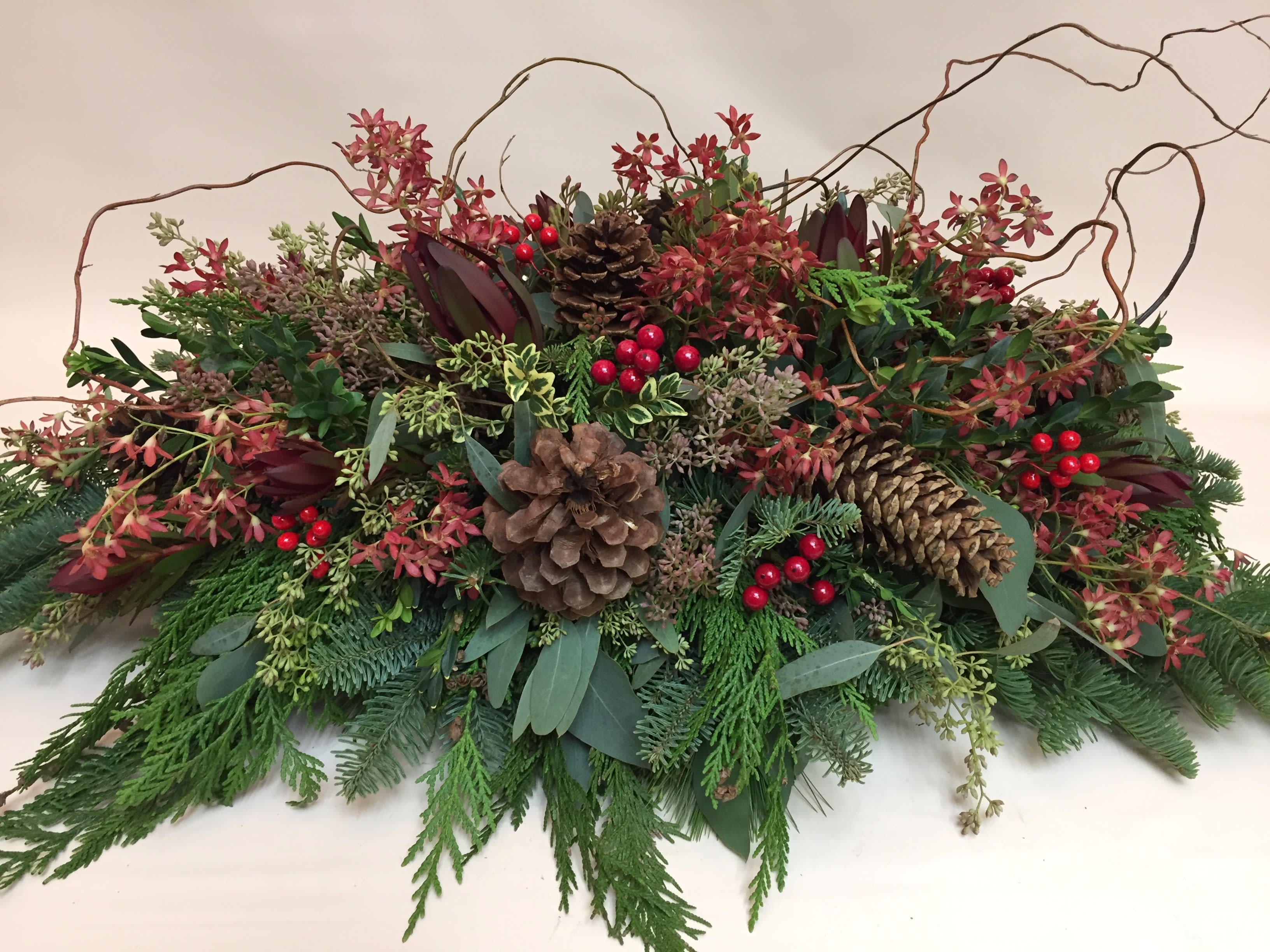 Nature's Best Centerpiece - Low oblong centerpiece of all-natural mixed foliage and berries. Designed in a rustic chic style - it's perfect when you're looking for an understated &quot;wow&quot;!