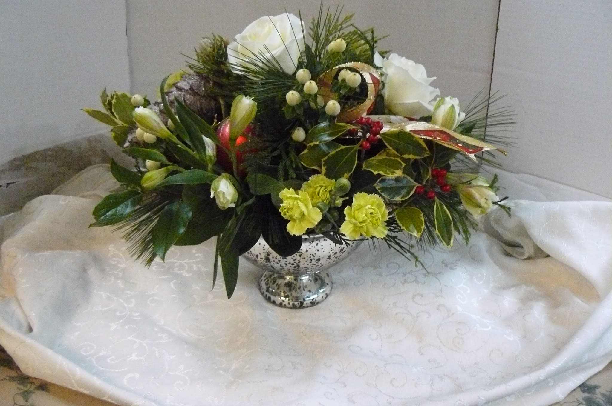 Christmas  Decorated  Centerpiece  (Pre-Order) - Roses, Hypericum, Alstroemeria, Seasonal Flowers, Seasonal Fancy Greens,  Decorative Ribbon. Call the Store for Delivery 908-234-2900