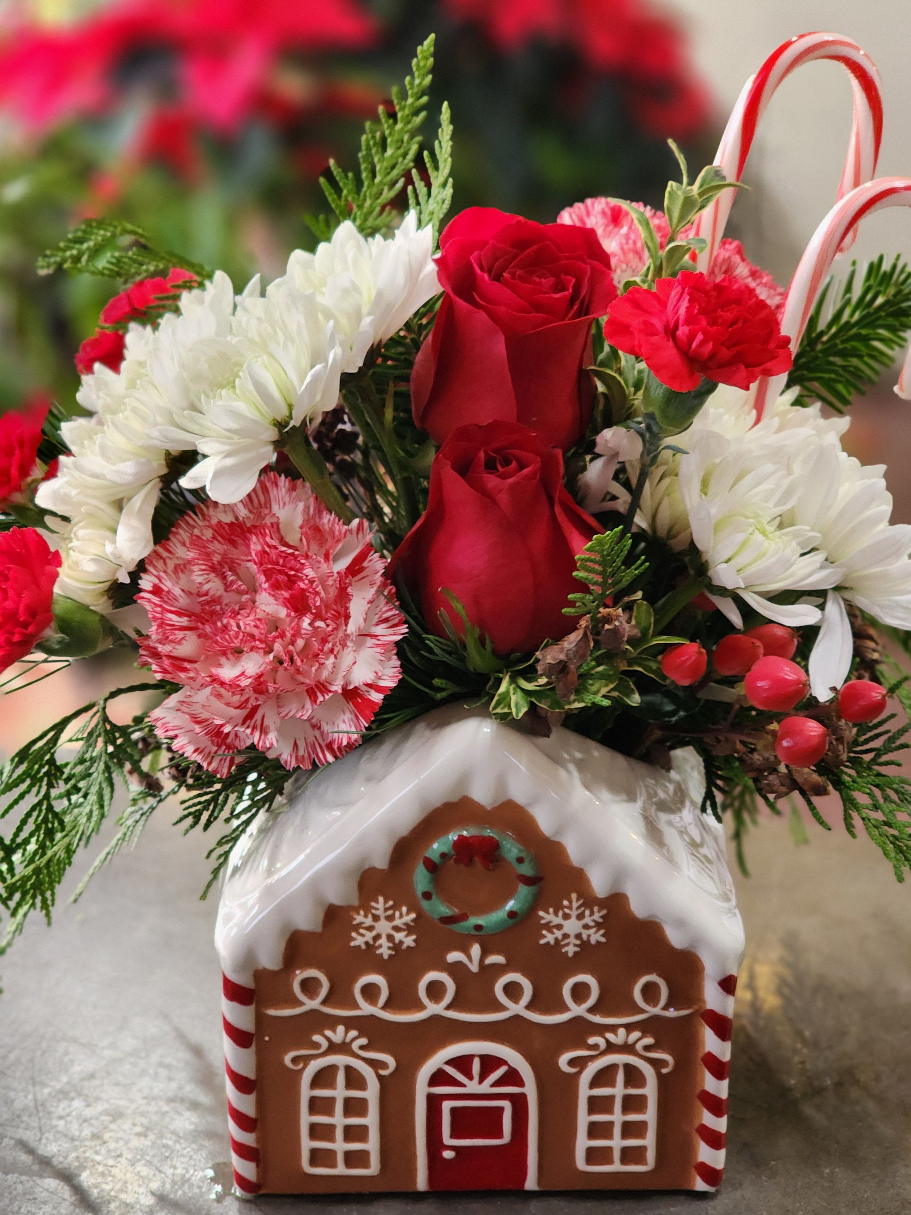  Gingerbread  Bakery - Keepsake ceramic gingerbread house fille with beautiful seasonal flowers.