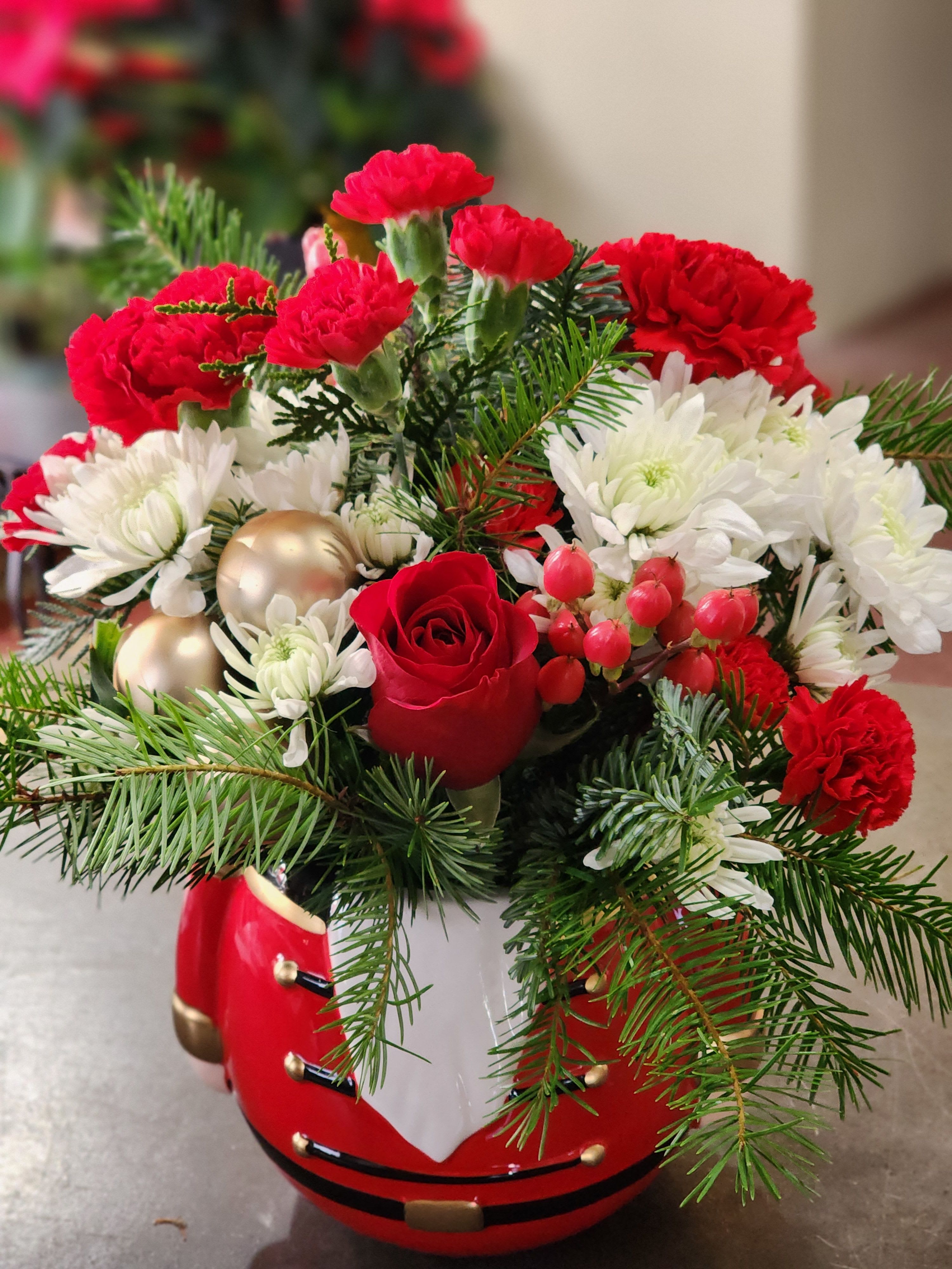 Merry Magic Nutcracker - Keepsake ceramic Nutcracker filled with the most fragrant flowers and evergreens of the holiday season.