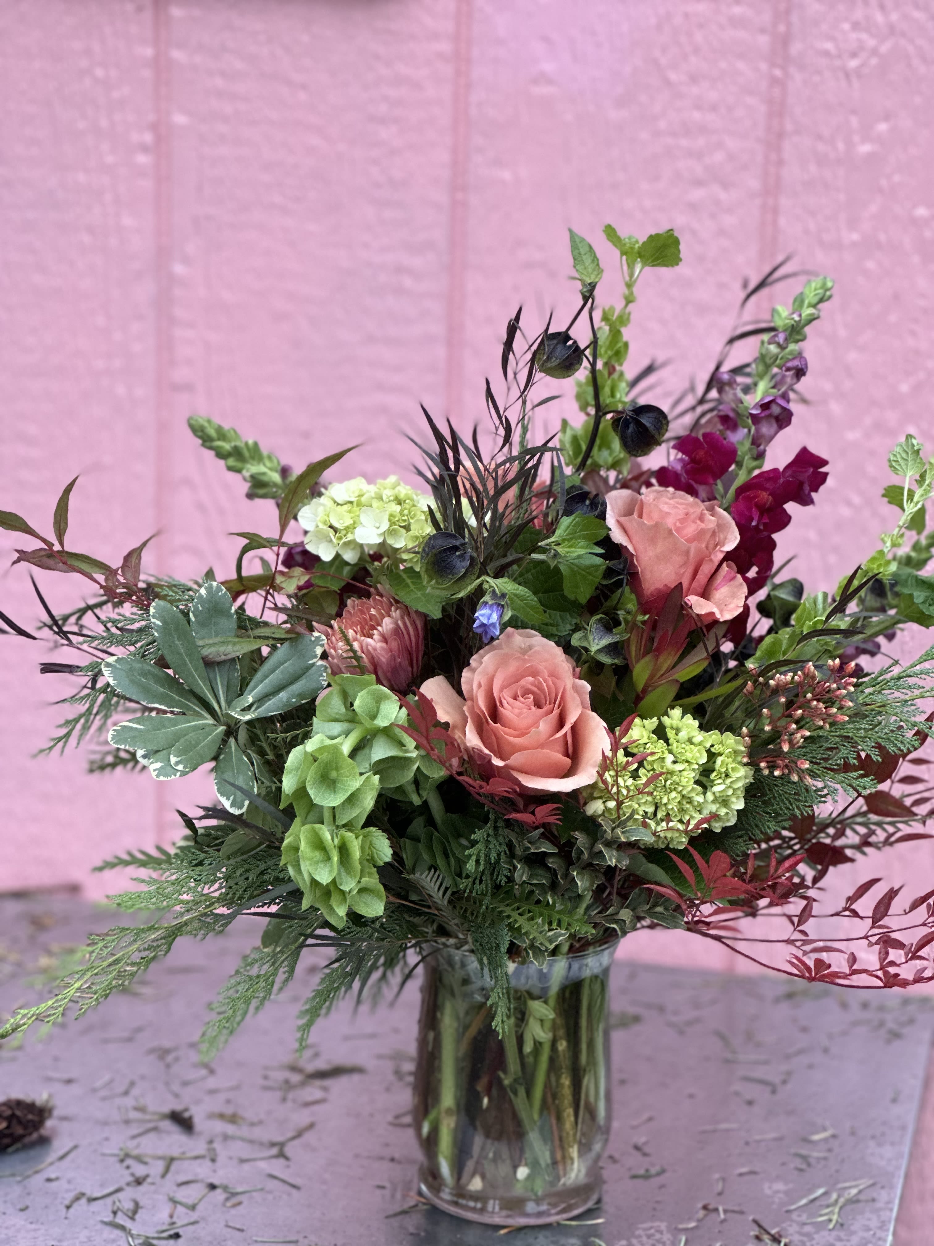 Mason Jar Designers Choice Bouquet - A Charming Bouquet Featuring the Freshest Blooms designed in a Mason Jar. *Please note that the photo shown is an example only. We design with only the finest blooms in the cooler for a long-lasting and beautiful bouquet.