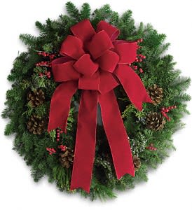 Classic Holiday Wreath - A beautiful noble fir wreath with juniper branches, pinecones and berry sprays is adorned with a brilliantly festive red velvet bow. Anyone would be delighted to have this arrive on their doorstep! 