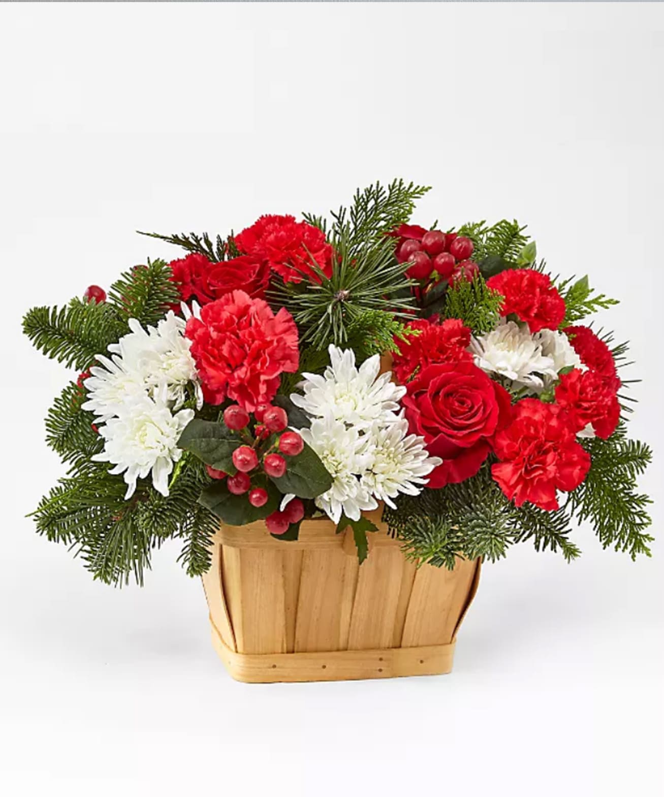 Good Tidings Floral Basket - Good Tidings Floral Basket with vibrant blooms and fresh accents of holiday greens. Approximately 15&quot; H x 17&quot; W.