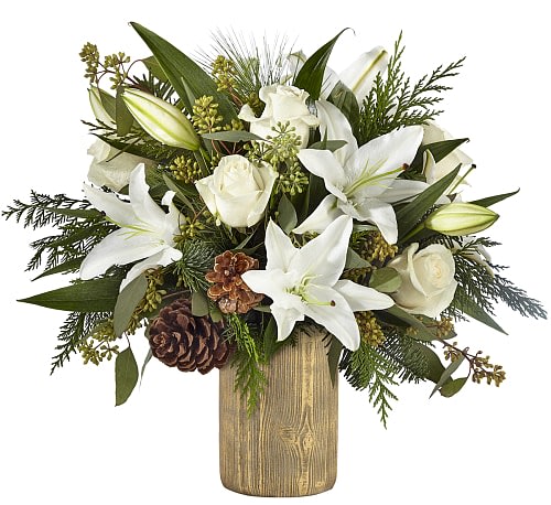 Joyous Greetings Bouquet -  The Joyous Greetings Bouquet is an elegant collection of ivory, cream, and green hues. Handcrafted with classic roses, Oriental lilies, and assorted Christmas greens, this bouquet brings the holiday cheer with each petal.