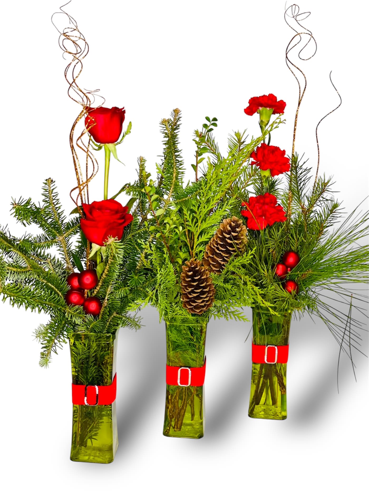 Jolly Holly set of vases  - Collection of three green glass vases filled with winter greens red roses red carnations pinecones perfect festive touch for any home use all three together or separate them throughout the house