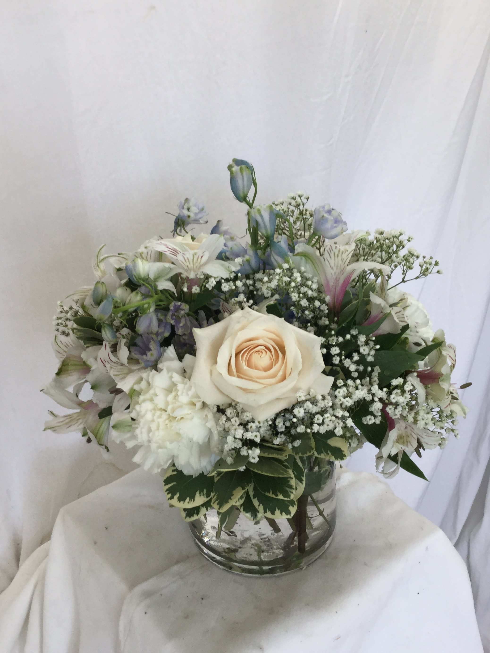 Winter Elegance Bouquet - This beautiful bouquet makes for a wonderful gift during the Winter Season. Bold, Elegant and handcrafted and designed with warmth in mind. Send to a loved one or treat yourself!