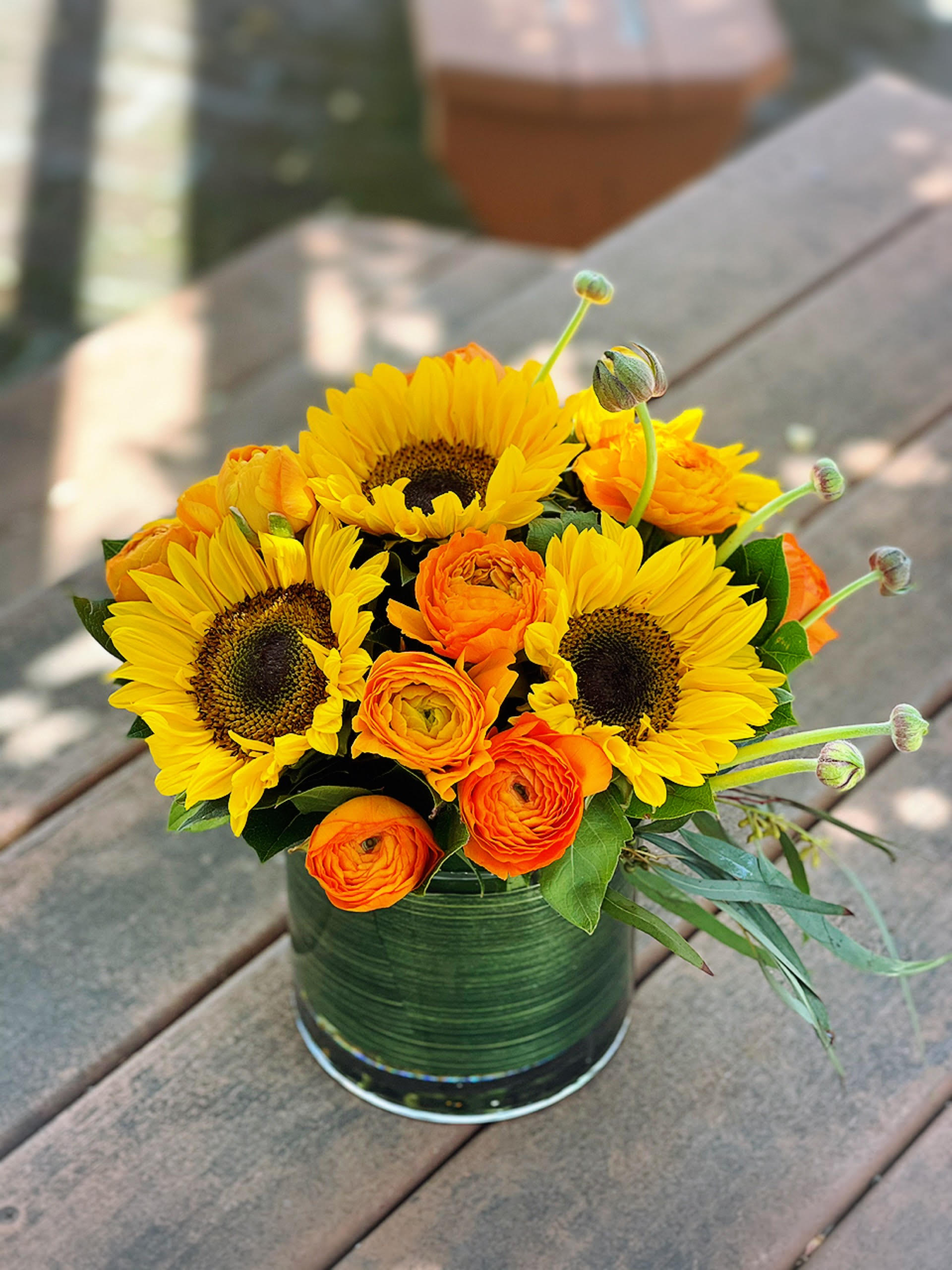 You Are My Sunshine - - 5 Orange Ranunculus - 5 Sunflowers - Greenery - 6 x 6 Inches Cylinder Vase