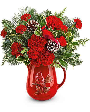 Teleflora's Scarlet Melody Bouquet - Teleflora's Scarlet Melody Bouquet hits a high note with bold red carnations and festive evergreens in Teleflora's Scarlet Cardinal Pitcher. A charming gift or centerpiece that sings with holiday spirit.