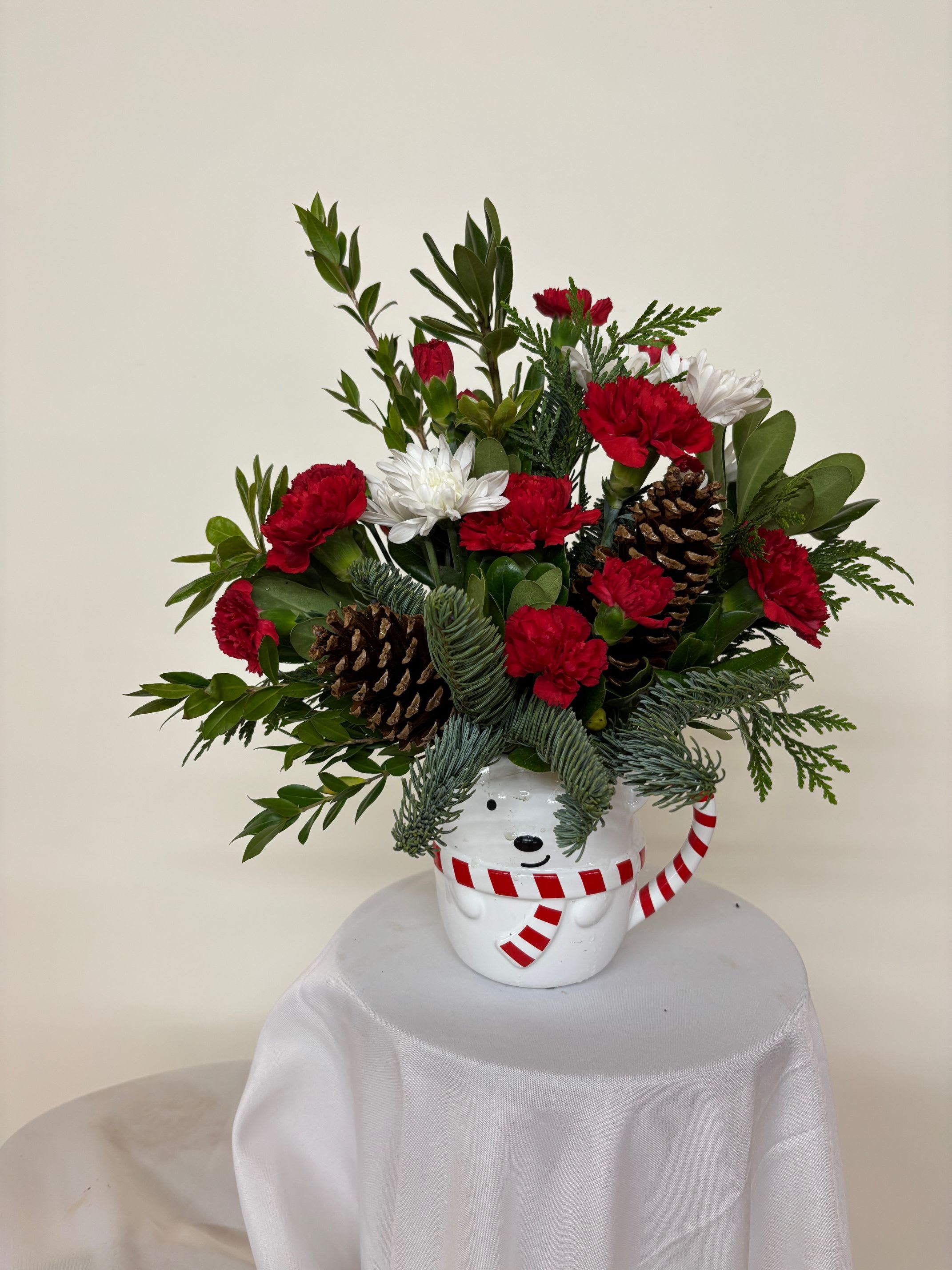 Mr. Polar Bear Snowman - Red and white carnations, cushion spray chrysanthemums, and pine cones