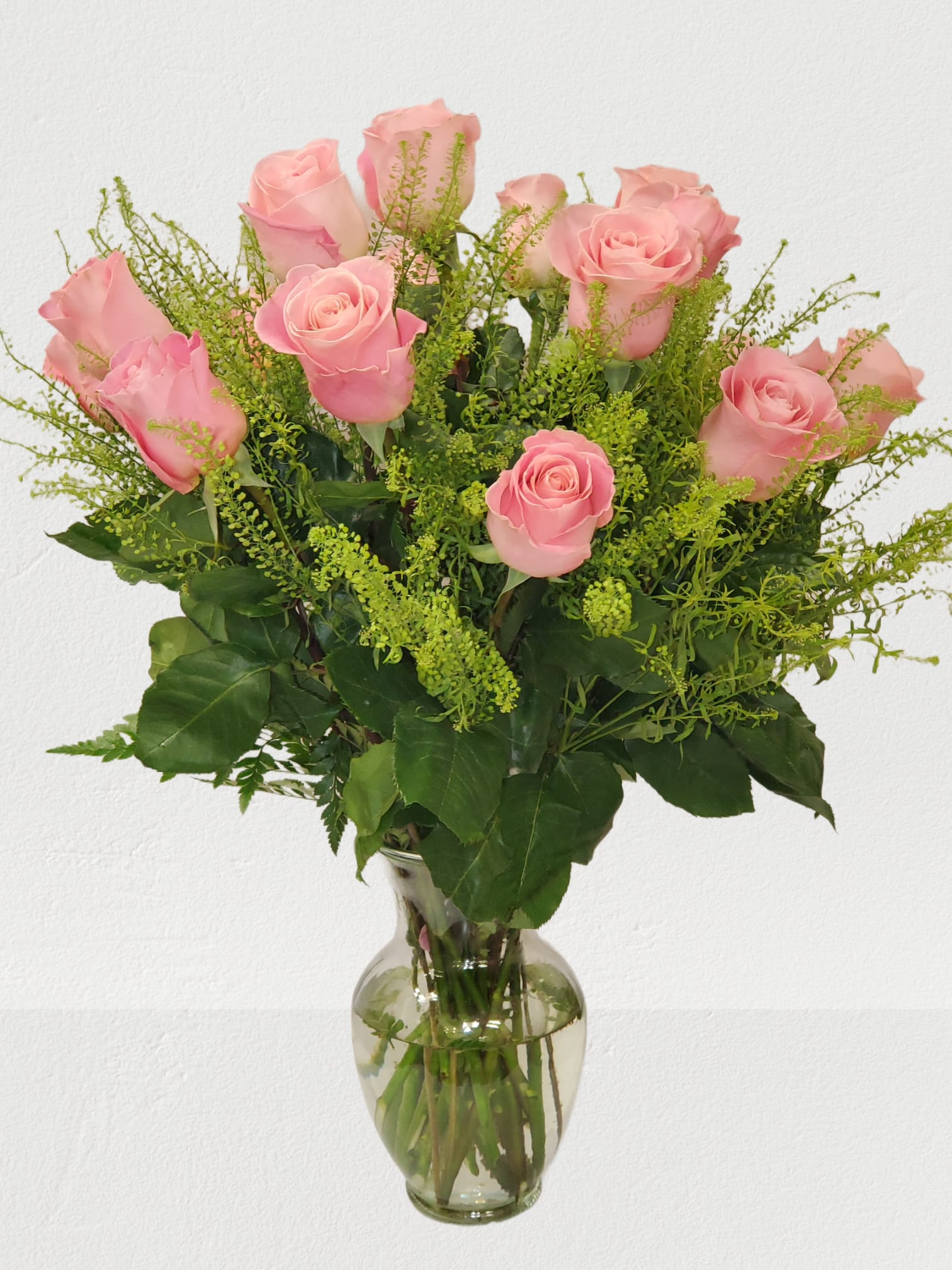 Light Pink Rose's clear vase (NO BABY BREATH) - Standard  18 Roses in a vase Deluxe   24 roses in a vase  Premium 36 roses in a vase 