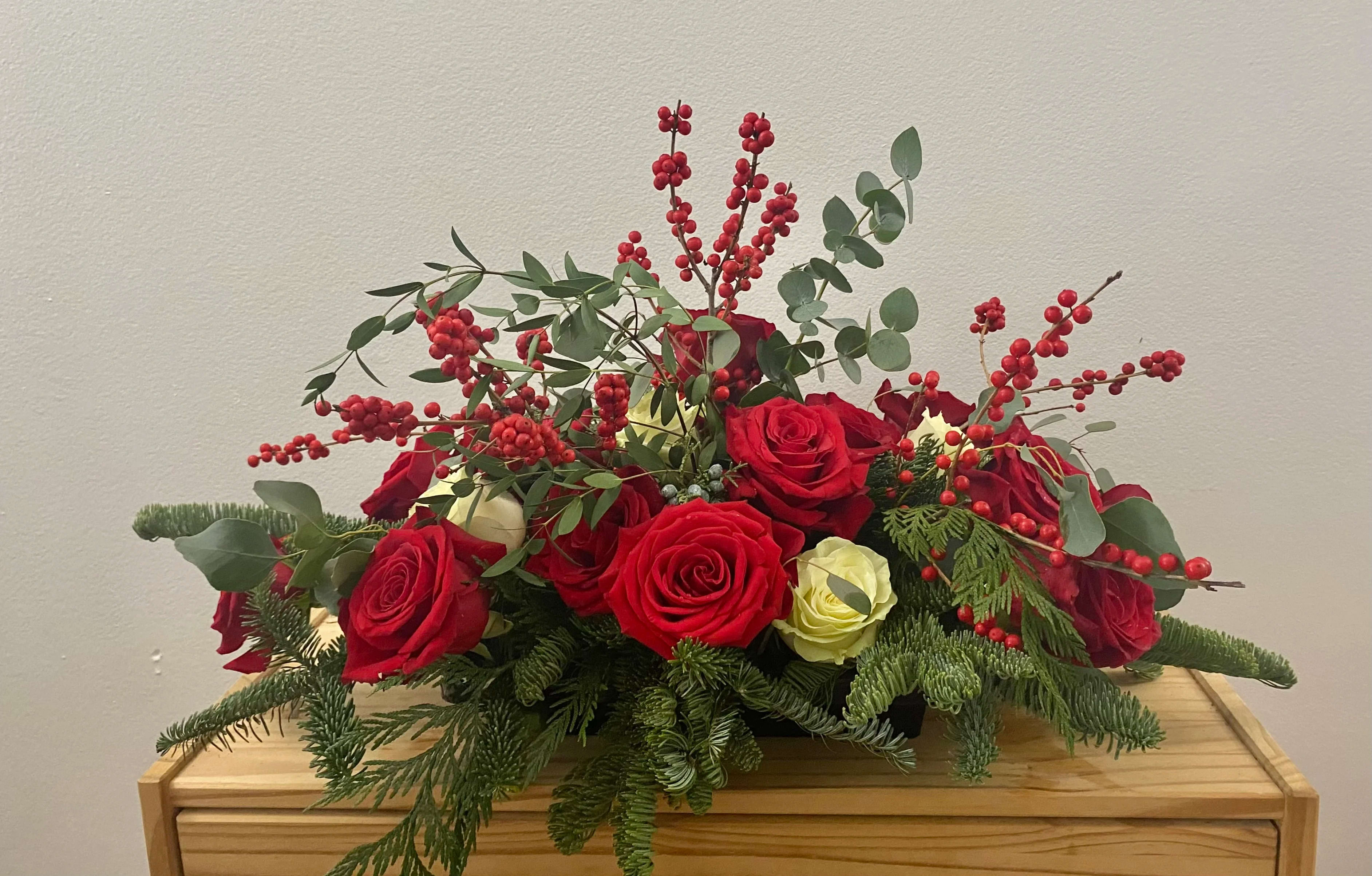 This Christmas  - Roses, berries, green in rectangular container 
