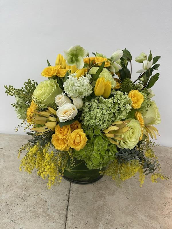 Mon Chéri Arrangements: A Bouquet of Love and Devotion - &quot;Mon Chéri,&quot; which translates to &quot;My Darling&quot; in French, is a term of endearment that conveys deep love and affection. The &quot;Mon Chéri Arrangements&quot; manifest this affection, a bouquet that symbolizes the passion and devotion between two individuals. This arrangement captures the essence of romance and love, combining exquisite flowers to express the sentiments of adoration and cherishing someone special. Join us as we explore the petals of this arrangement, where each flower becomes a token of love and devotion.   Varieties and colors of flowers may vary according to season and availability. This arrangement includes a newly cleaned vase and good quality water &amp; flower food.  Item: 411  Care Instructions: Change the water every two days for the best vase life.