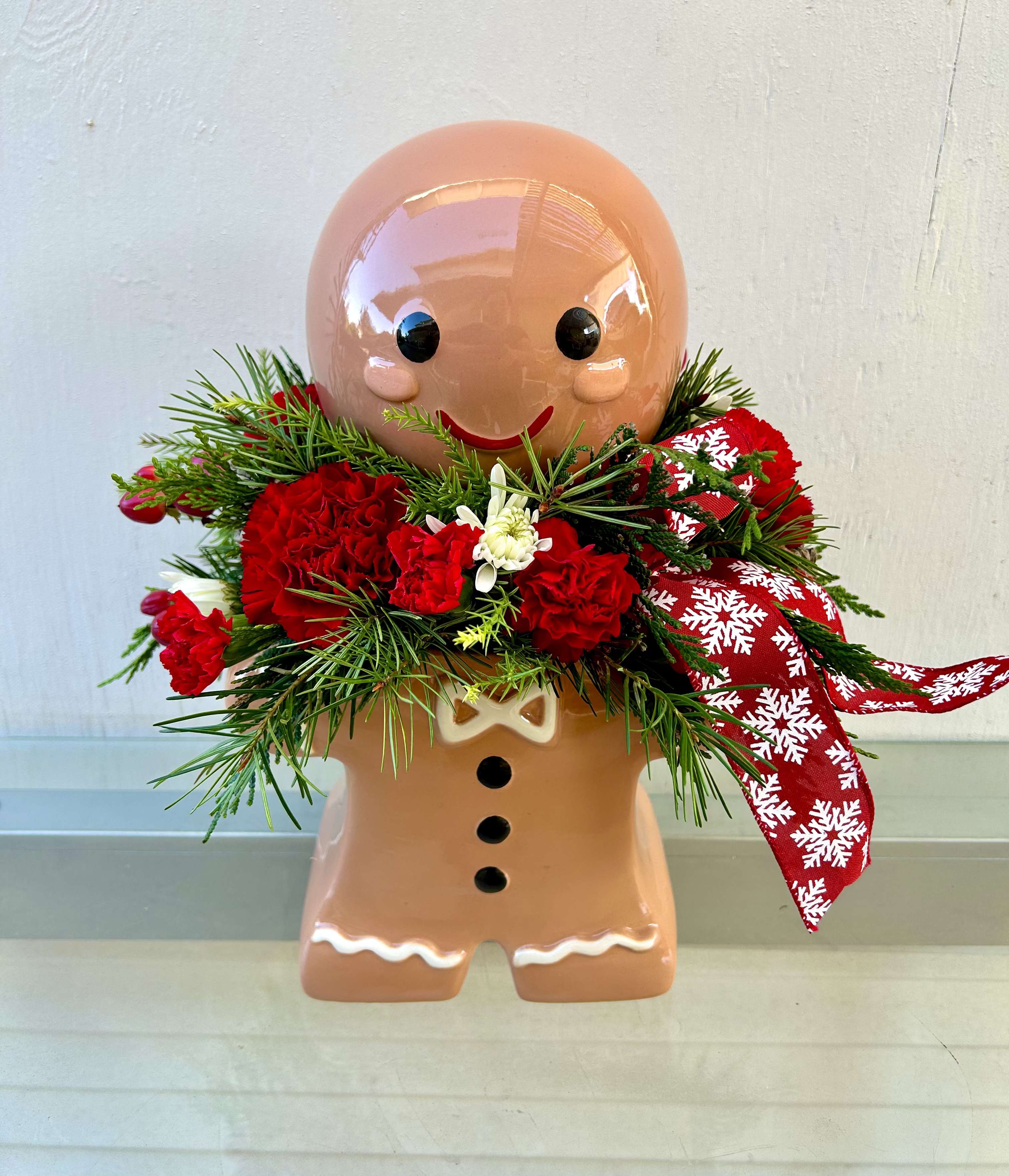 Ginger Bread Cookie Jar - Winter greens and red, white and green flowers in a cookie jar. The cutest keepsake you can give.