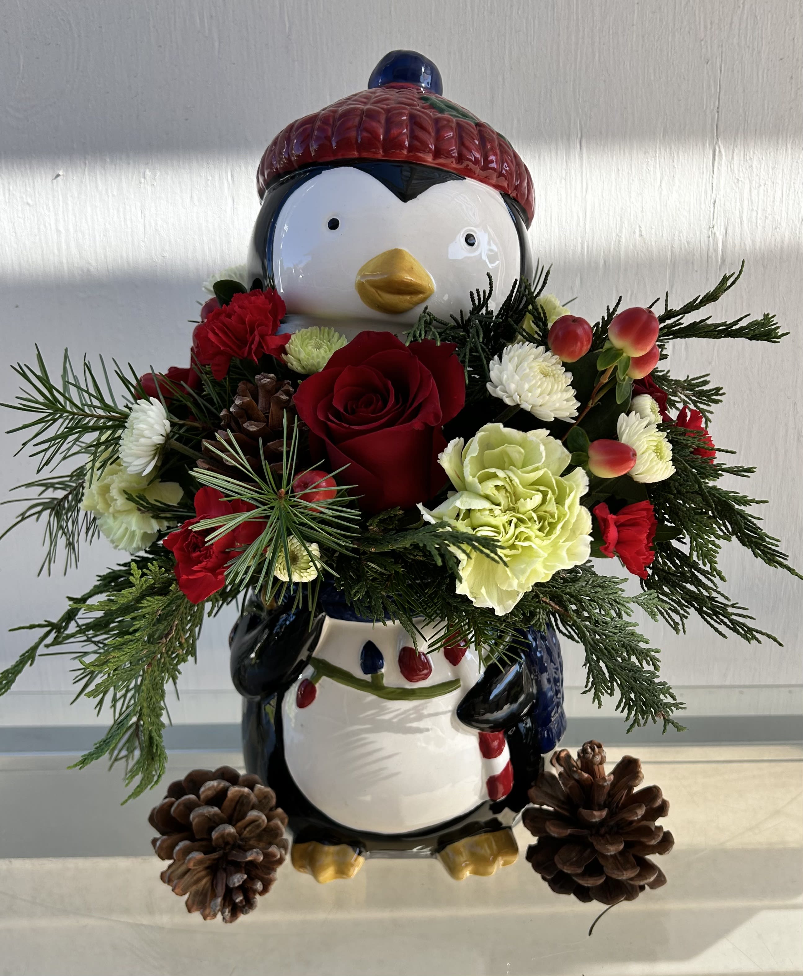 Penguin Cookie Jar - This Penguin Cookie jar is perfect for the holiday season, once the flowers are gone your loved one will have a keepsake gift from you to use for years to come. 