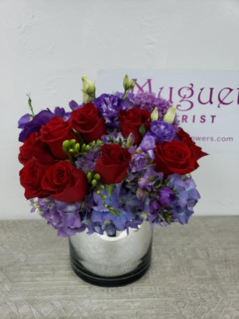 Perfect Love: Romantic Flower Arrangement - &quot;Perfect Love&quot; is a romantic floral arrangement that encapsulates the essence of love and passion. With a carefully curated selection of flowers, this arrangement seeks to convey the depth and beauty of a perfect love story. Join us as we explore the enchanting world of &quot;Perfect Love,&quot; where each bloom becomes a symbol of affection, tenderness, and the timeless beauty of a love that is truly extraordinary.  Varieties and colors of flowers may vary according to season and availability. This arrangement includes a newly cleaned vase and good quality water &amp; flower food.  Item: 1723  Care Instructions: For the best vase life, change the water every two days.  