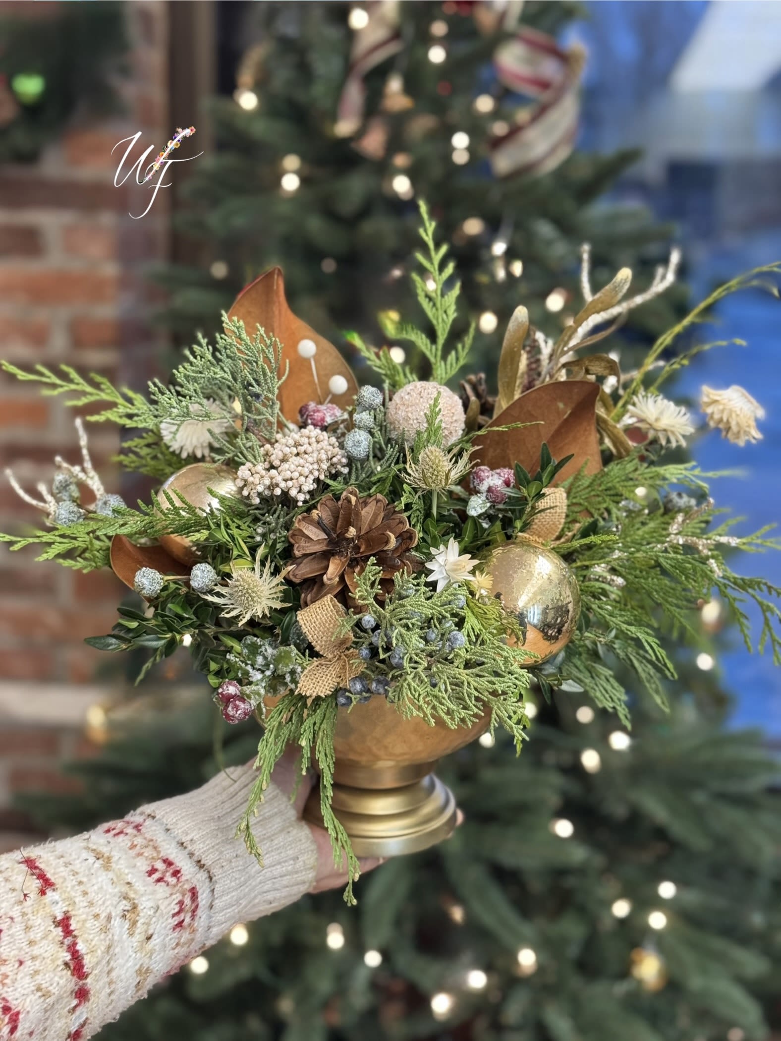 Rustic Holiday Magic - This beautiful design is filled with evergreens, light florals and  holiday accents for the perfect mix of nature and elegance 