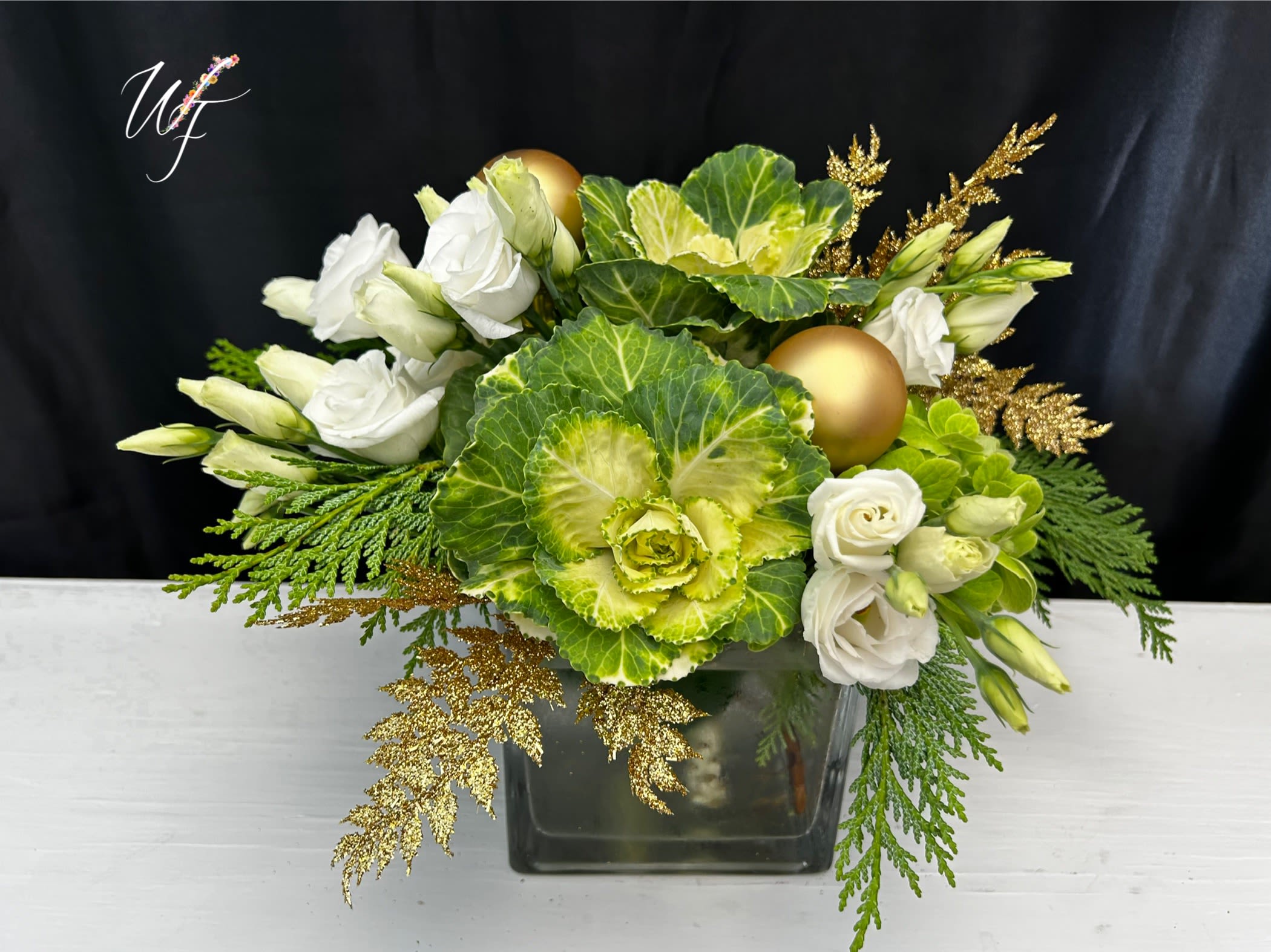 Grinch’s Delight  - Lime green and white florals with a contemporary twist that is sure to grow someone’s heart!