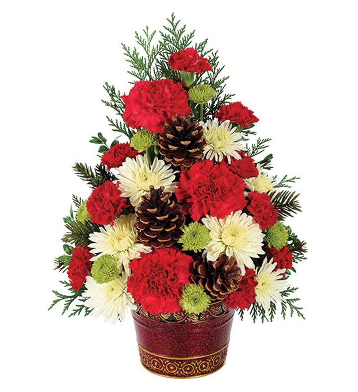 Christmas Tree Celebration - Recipe Details: Carnations, Mini Carnation, Cushion Poms, Button Poms, Pinecones, &amp; Assorted Christmas Greens Dimensions: Arrangement Height 14&quot;, Length 11&quot;