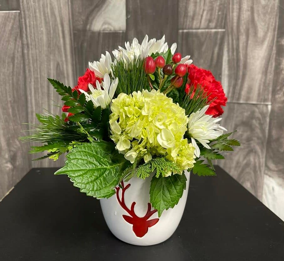 Oh Deer!  It's Christmas! - This cute deer container adorned with fresh Christmas blooms will brighten anyone's day!
