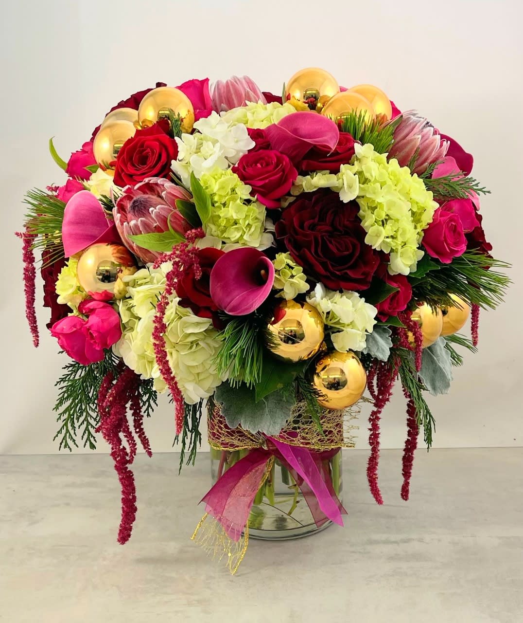Holiday Grandeur Bouquet - Holiday Grandeur says it all. Embodying the ultimate expression of the Christmas spirit, your thoughtfulness will be cherished throughout the holiday season.