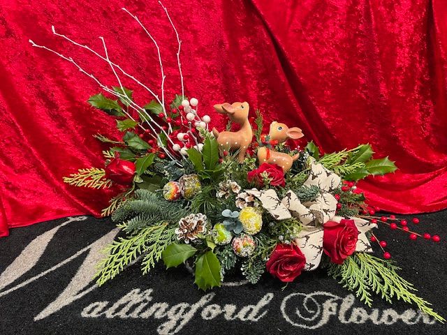 IN THE ORCHARD - This design features two deer who are surrounded by winter greens, flowers, and fruit accents. This unique design is perfect for the nature lover on your list!