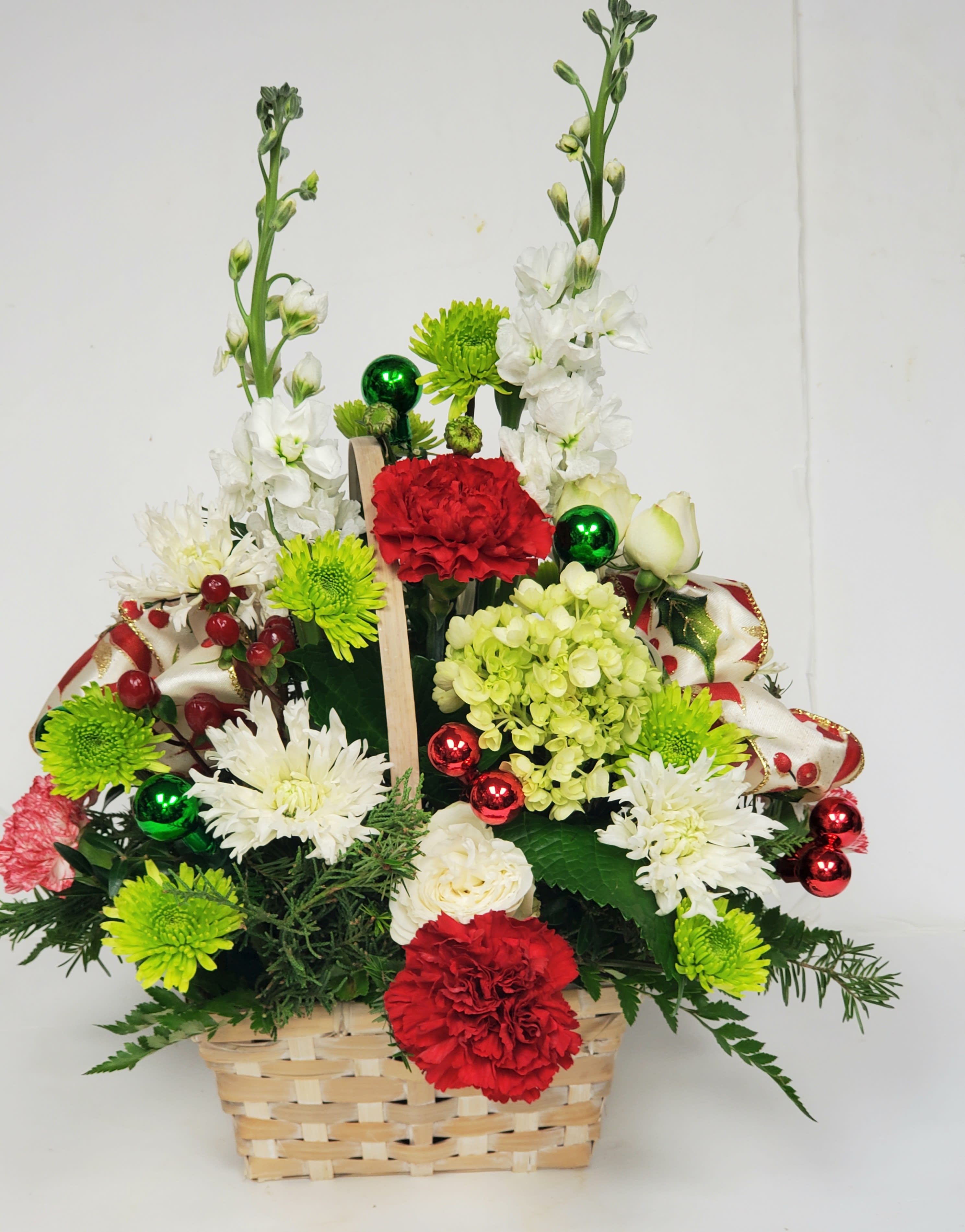 Christmas cheer. - Red white and greens bringing the spirit of the holiday season to your loved ones door.