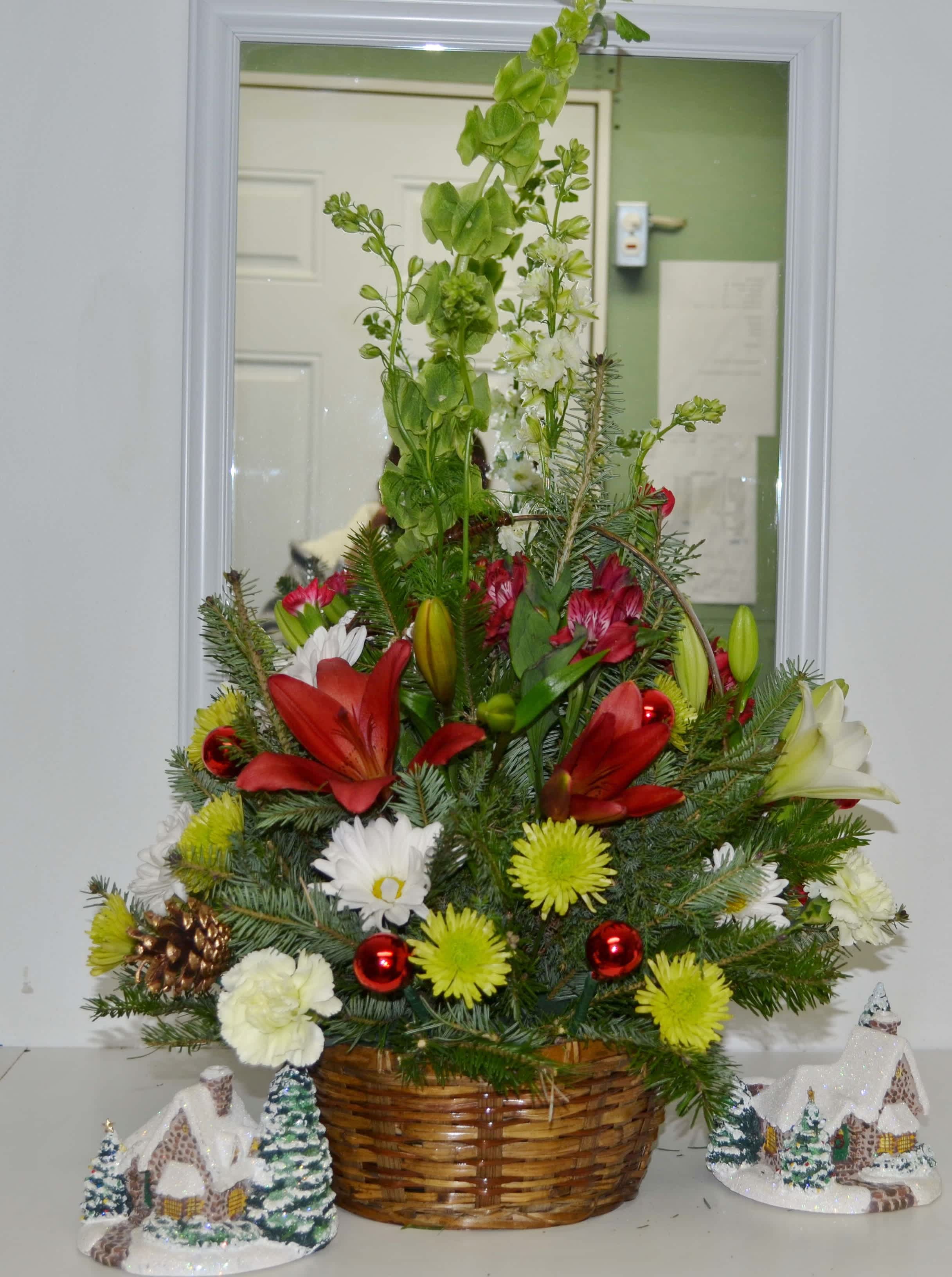 Christmas Basket - Mixed basket of xmas colors highlighted with mini xmas balls .