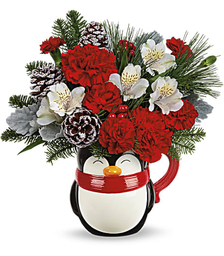 North Pole Penguin - Bursting with Christmas blooms, this perky penguin is delighted to deliver your best wishes for a happy holiday season! The glazed ceramic mug is food-safe for sipping fun.