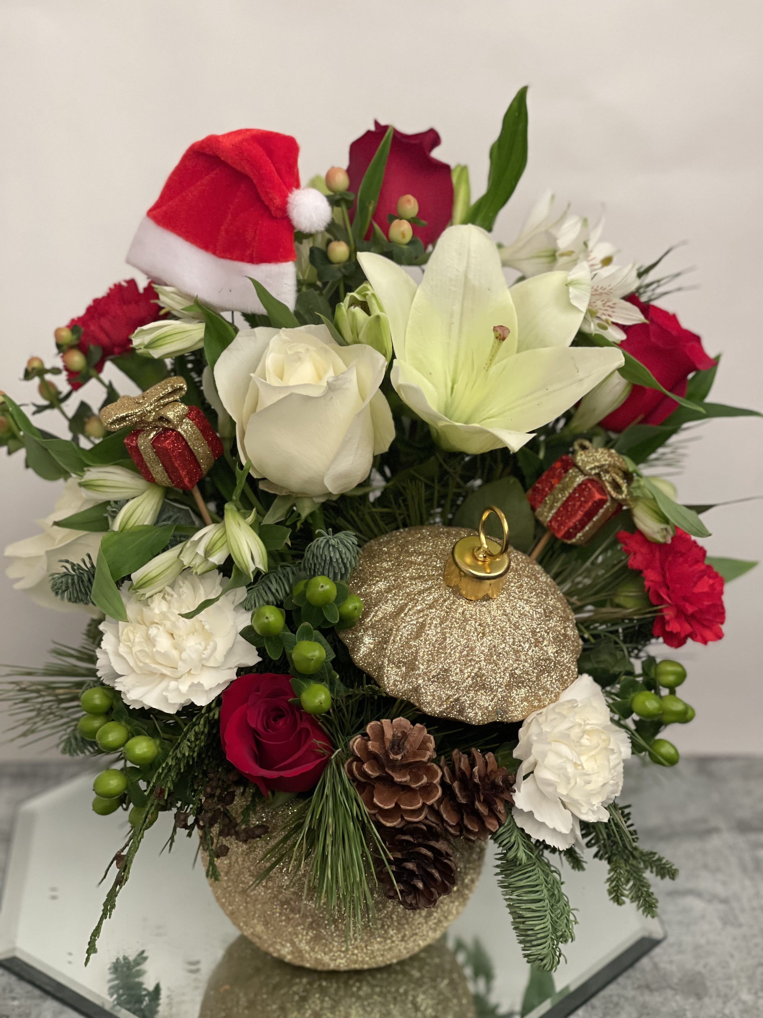 Gold ornament w/ red and white floral  - Ornament is a keeper 