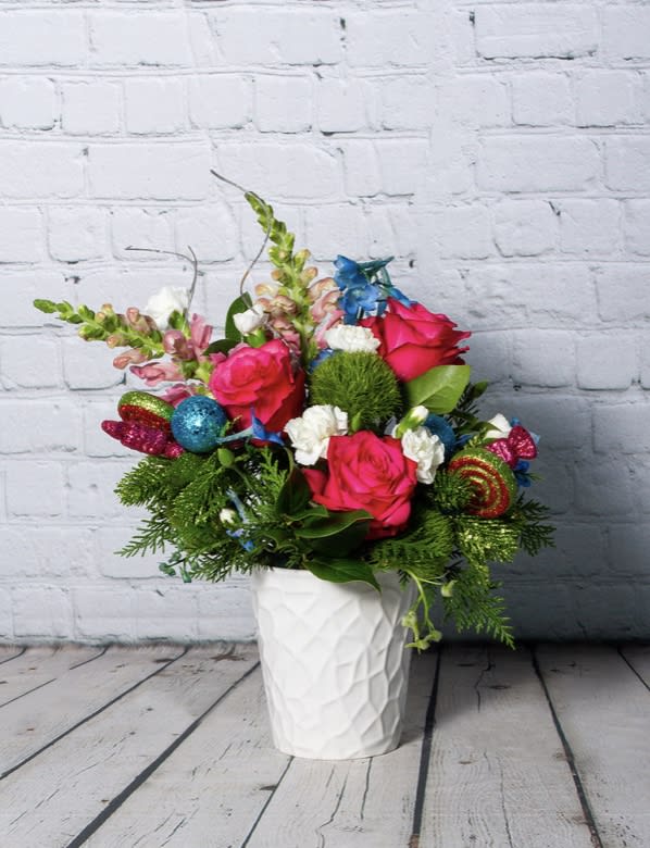 Land of Sweets - Looking for something a little different from the red, white, and green Christmas arrangements? This design was inspired by the Nutcracker Ballet Suite, when Clara and the Nutcracker Prince journey to the Land of Sweets.