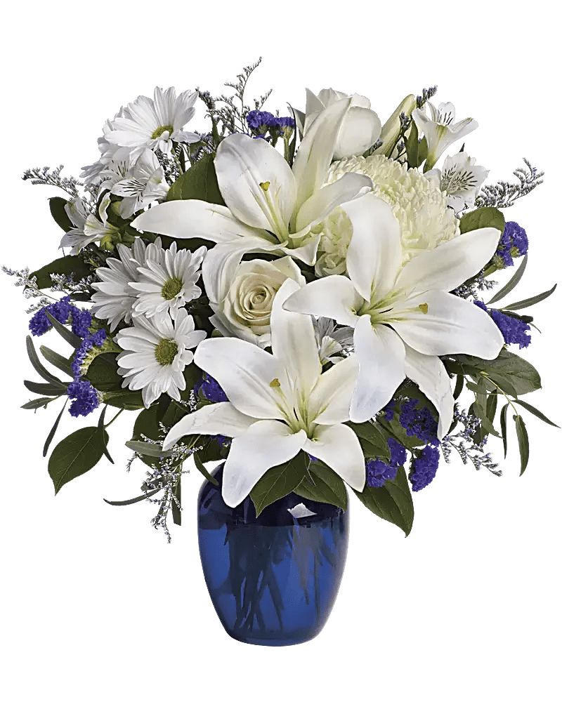 Beautiful In Blue - Elevate any moment with Heavenly Blue Serenity, a stunning floral arrangement featuring white lilies, roses, alstroemerias, and blue delphiniums in a striking blue vase. Perfect for expressing peace and elegance. Order fresh flowers today for delivery in Warrington, PA, and share serenity!