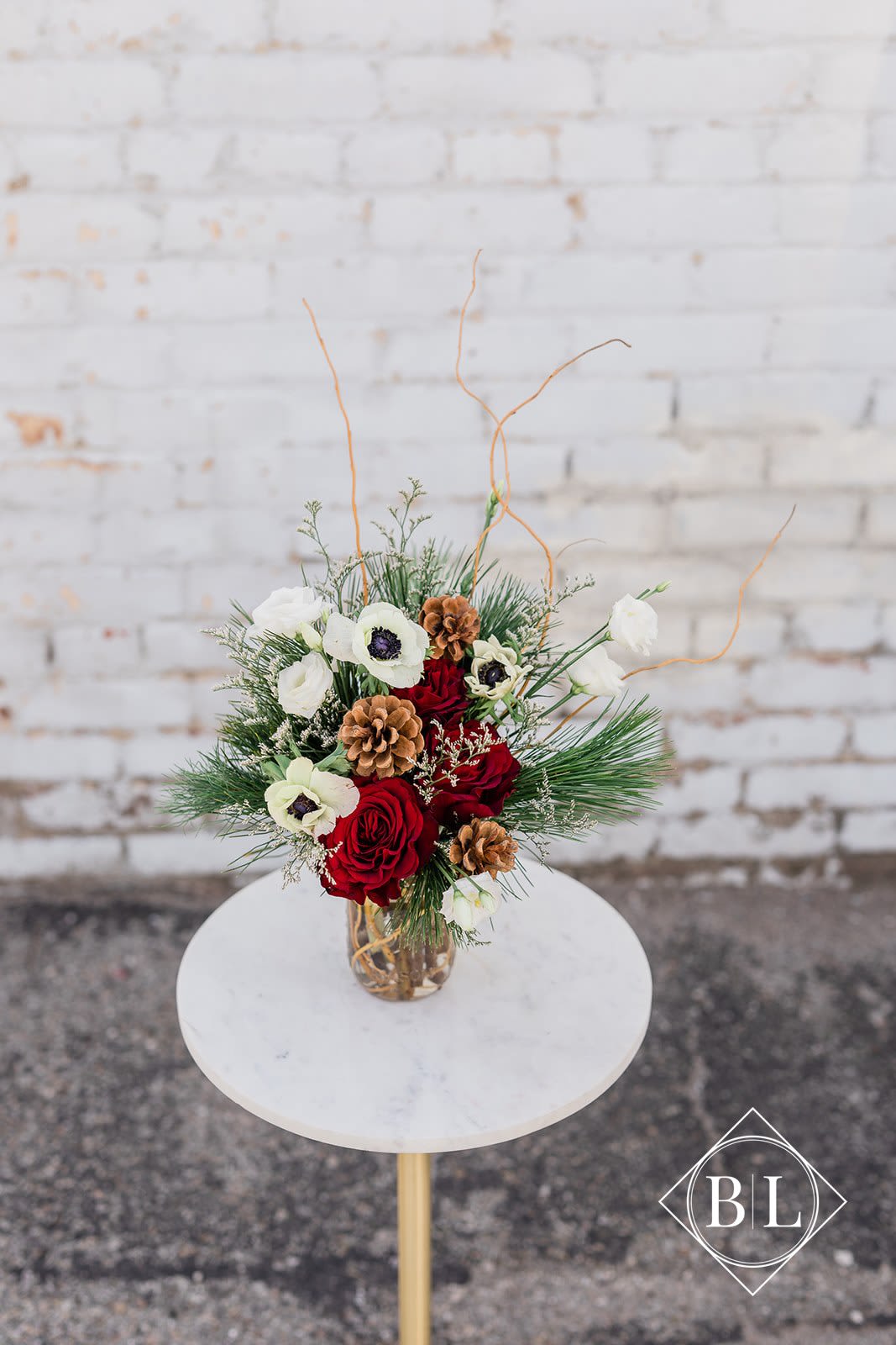 Seasonal Mason Jar Mix - The Seasonal Mason Jar comes arranged with a beautiful mix of seasonal blooms and textures, all playfully designed in one of our hand-picked designer bud vases.  Only comes in 1 size. Photos are a representation of what could be sent. Please specify any preferences (if applicable) and we will do our best to accommodate or call our studio! 