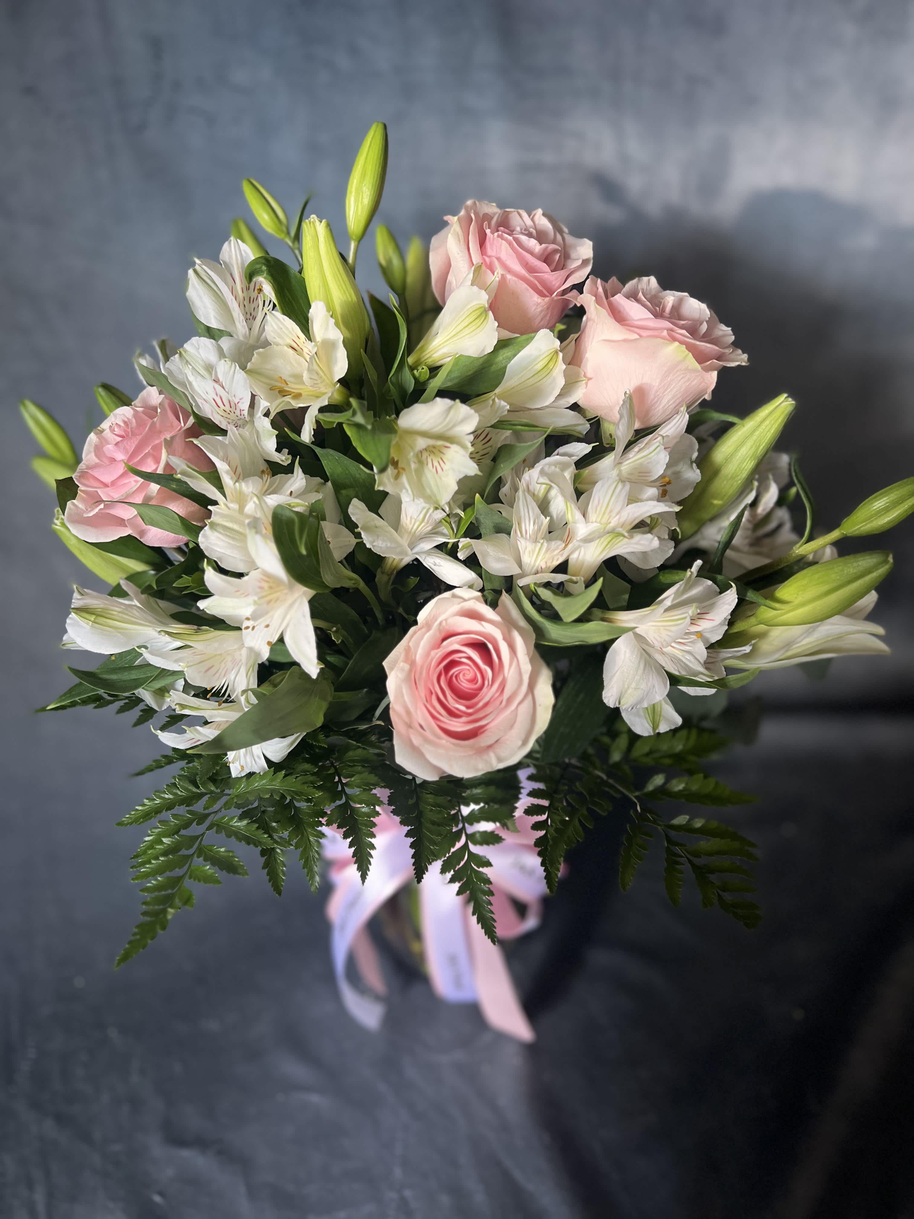 Cute Pie  - introducing Our New Design Cute Pie , beautifully arranged with white lilies, pink roses, alstroemerias to celebrate your loved ones.   The size shown is the standard size