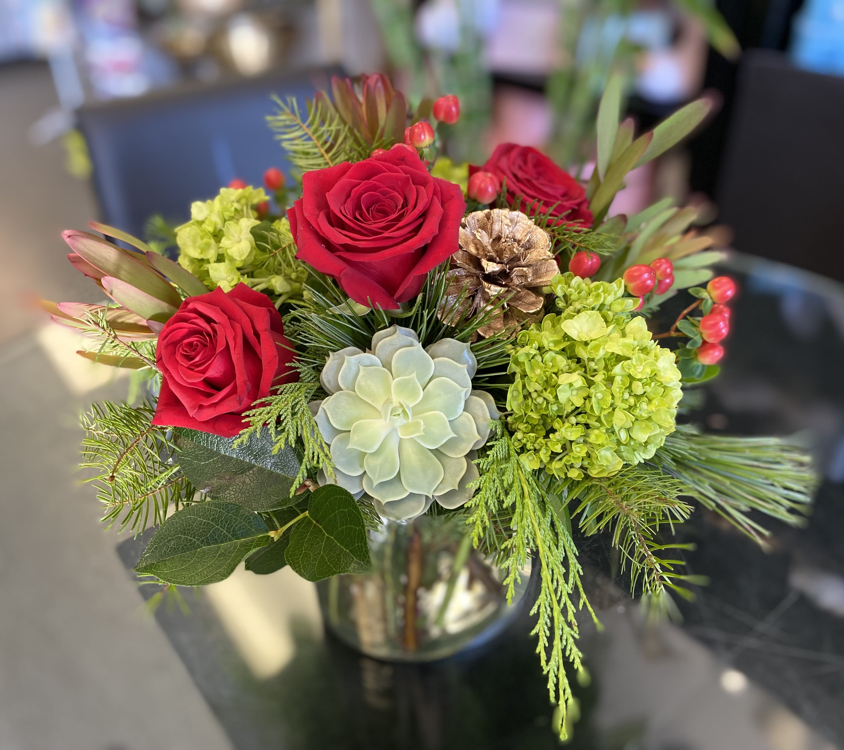 Christmas in The Desert - Succulent, Red and green flowers in a vase