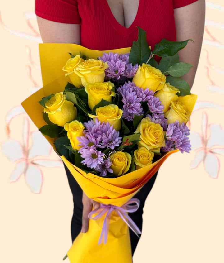 Short Stem Yellow Roses Lavender Daisies Hand Wrapped Bouquet  - Send  a wonderful expression of happiness and cheer!  with this bright yellow short stem  roses and lavender daisies. Accented with lush greens and wrapped in gift wrap paper, dressed with ribbon. A beautiful way to celebrate a birthday, or any of life's special moments.  March 21st is #nationalflowerday make sure to send yellow flowers  