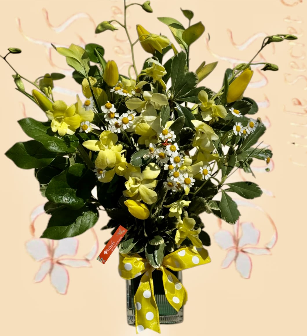 Yellow Gift  Orchids Tulips Arrangement In A Cube Vase - An exotic design of yellow orchids mixed with yellow tulips, accented with chamomile. Arranged in a cube vase. Perfect gift for congrats, for the spring, summer transition, birthday, or March 21st  #nationalflowerday make sure to send yellow flowers!