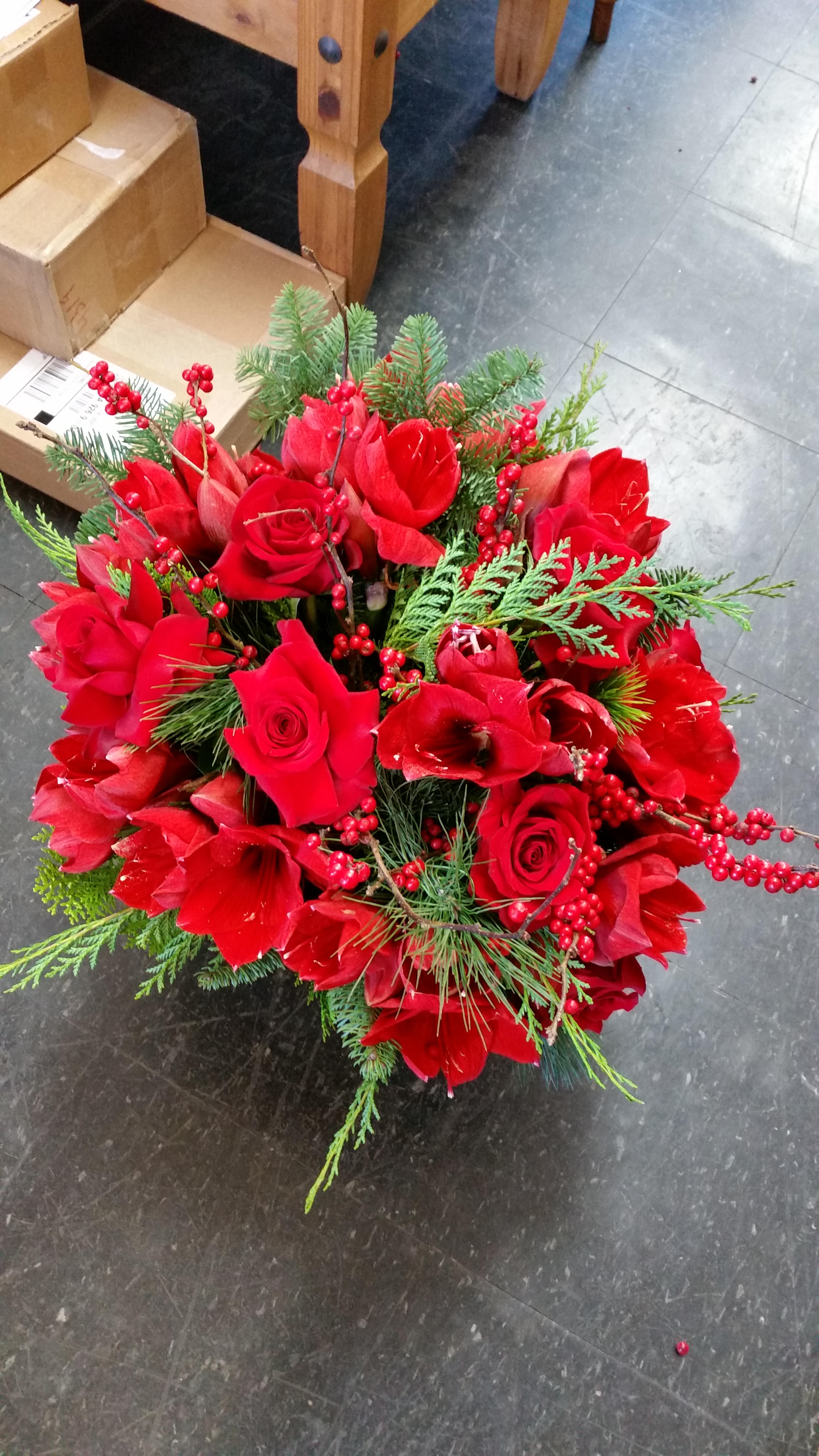 holiday red - ilex, red roses, amaryllis. x-mas greenery