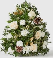 Snowed In Tree - No need to brave the cold this winter when you can bring the beauty of the outdoors in with our Snowed In Tree, a handcrafted mini tree featuring icy white blooms. This gift can make birthdays brighter, holidays more cheerful, and everything in between. UPGRADE Upgrade this gorgeous tree to be nestled in a reusable metal planter with copper finish and wooden stand. (Deluxe version)