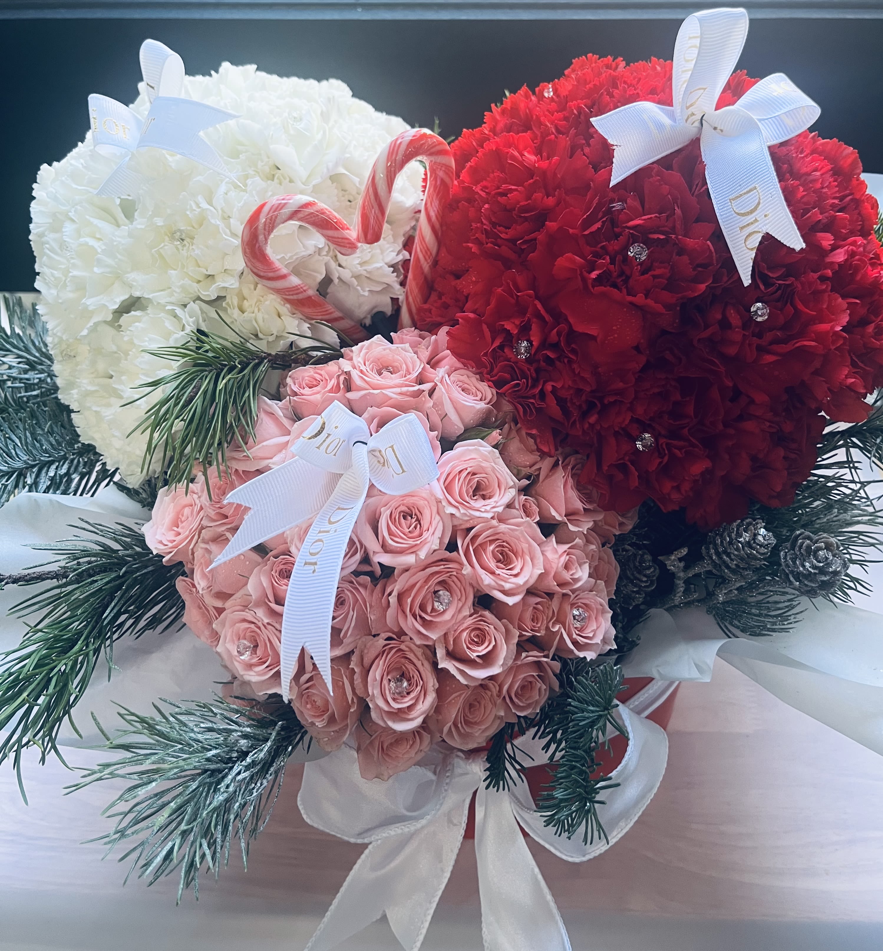 Holiday Cheer - Christmas bulbs made of roses and carnations in a gift box 